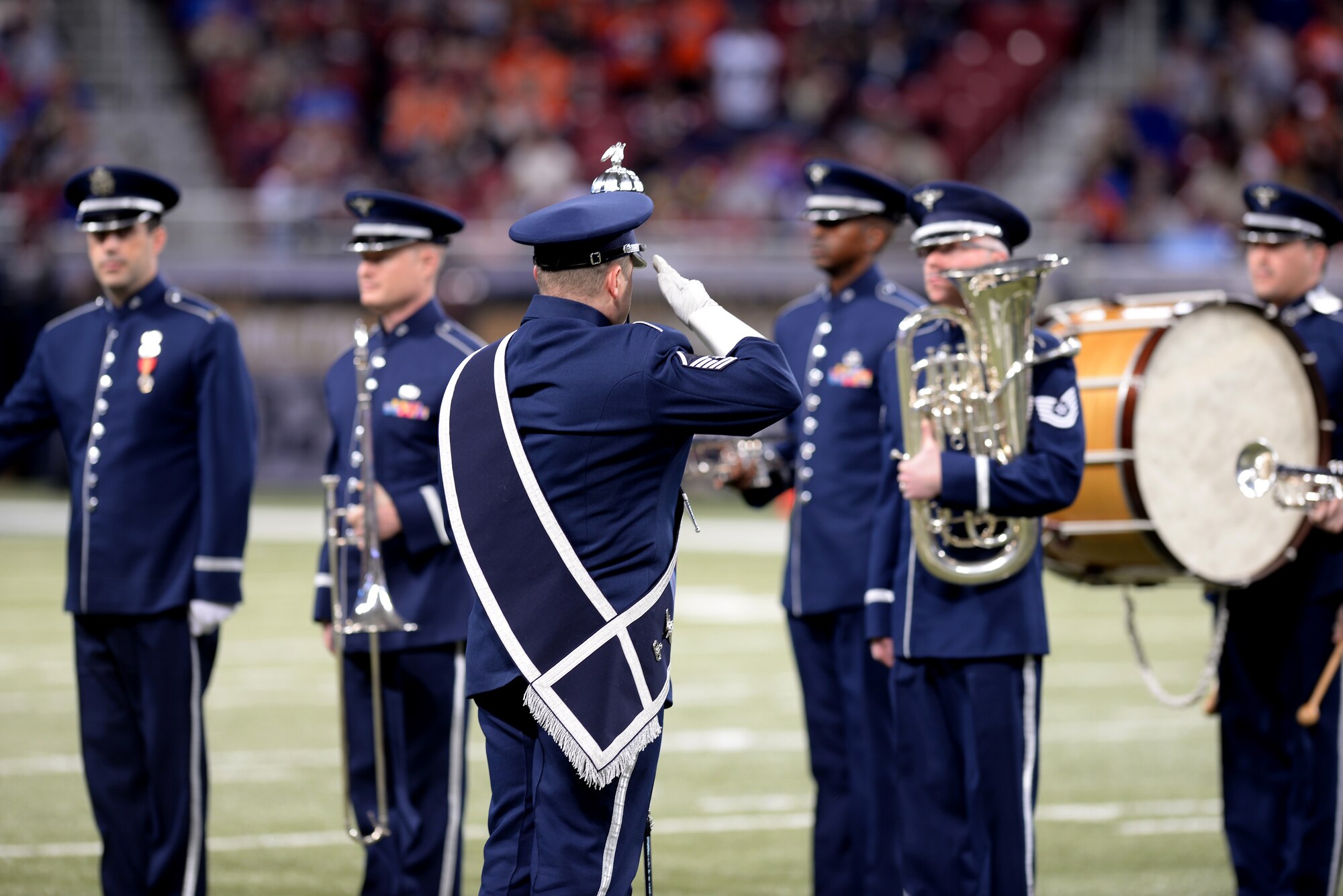 The U.S. Air Force Band of Mid-America march during Military Appreciation Day's halftime ceremony in the Edward Jones Dome, St. Louis, Nov. 16, 2014. The day included honoring wounded warriors as well as honor guards from every branch of the Armed Forces presenting the colors. The St. Louis Rams went up against the Denver Broncos, with the Rams winning 7-22. (U.S. Air Force photo by Airman 1st Class Erica Crossen)