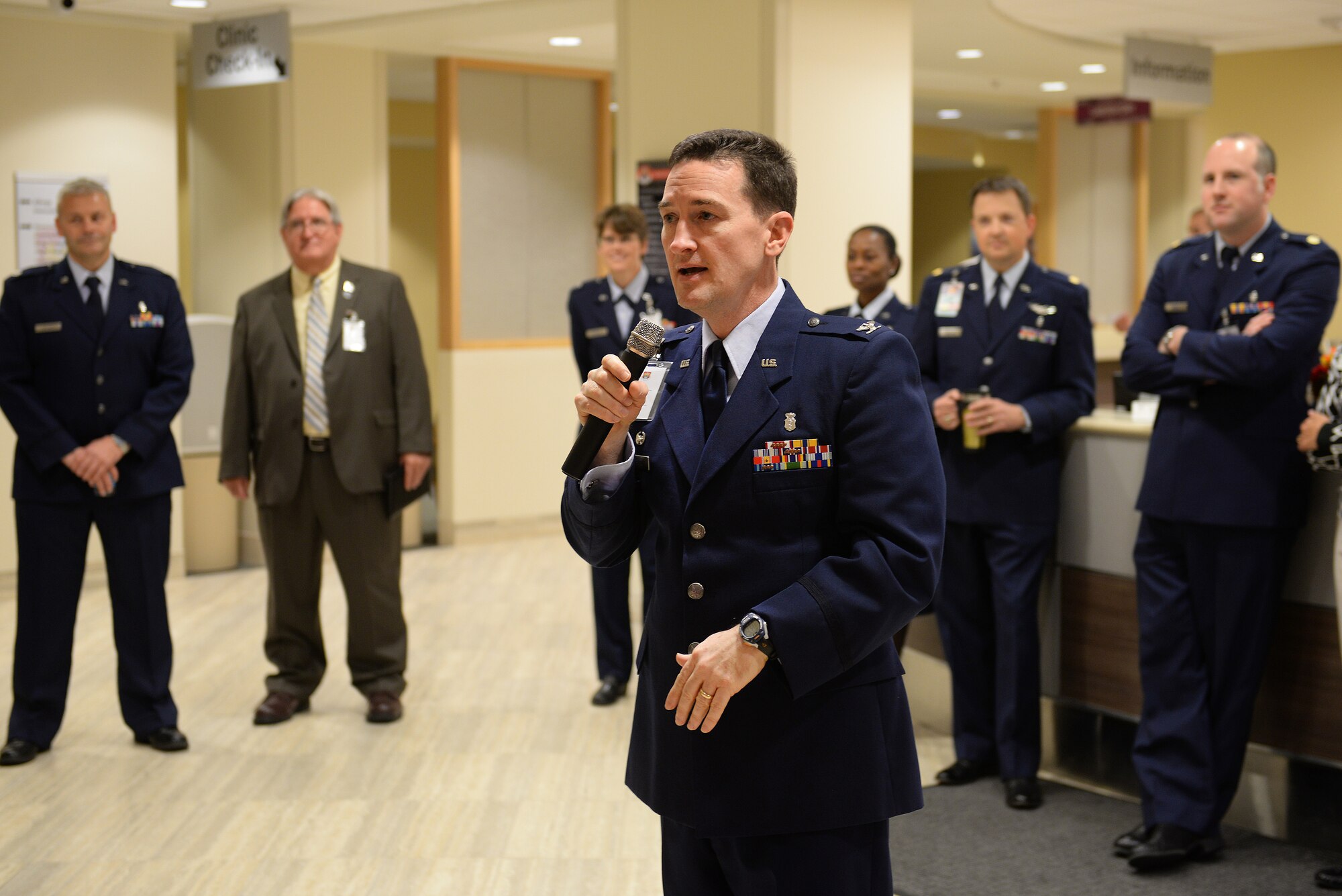 Col. Bret Burton, 375th Medical Group Commander, speaks during the 3rd Annual Network Provider’s Social, Scott AFB, Ill., Nov. 6, 2014. He spoke about the historical significance of medical care at Scott AFB, beginning in 1918, when one of two air transport crafts available transported an aviator with a broken leg. The social’s intention is to provide a venue for off-base providers and the 375th Medical Group to foster a working relationship, making off-base care for beneficiaries a smoother process. (U.S. Air Force photo by Airman 1st Class Erica Crossen)