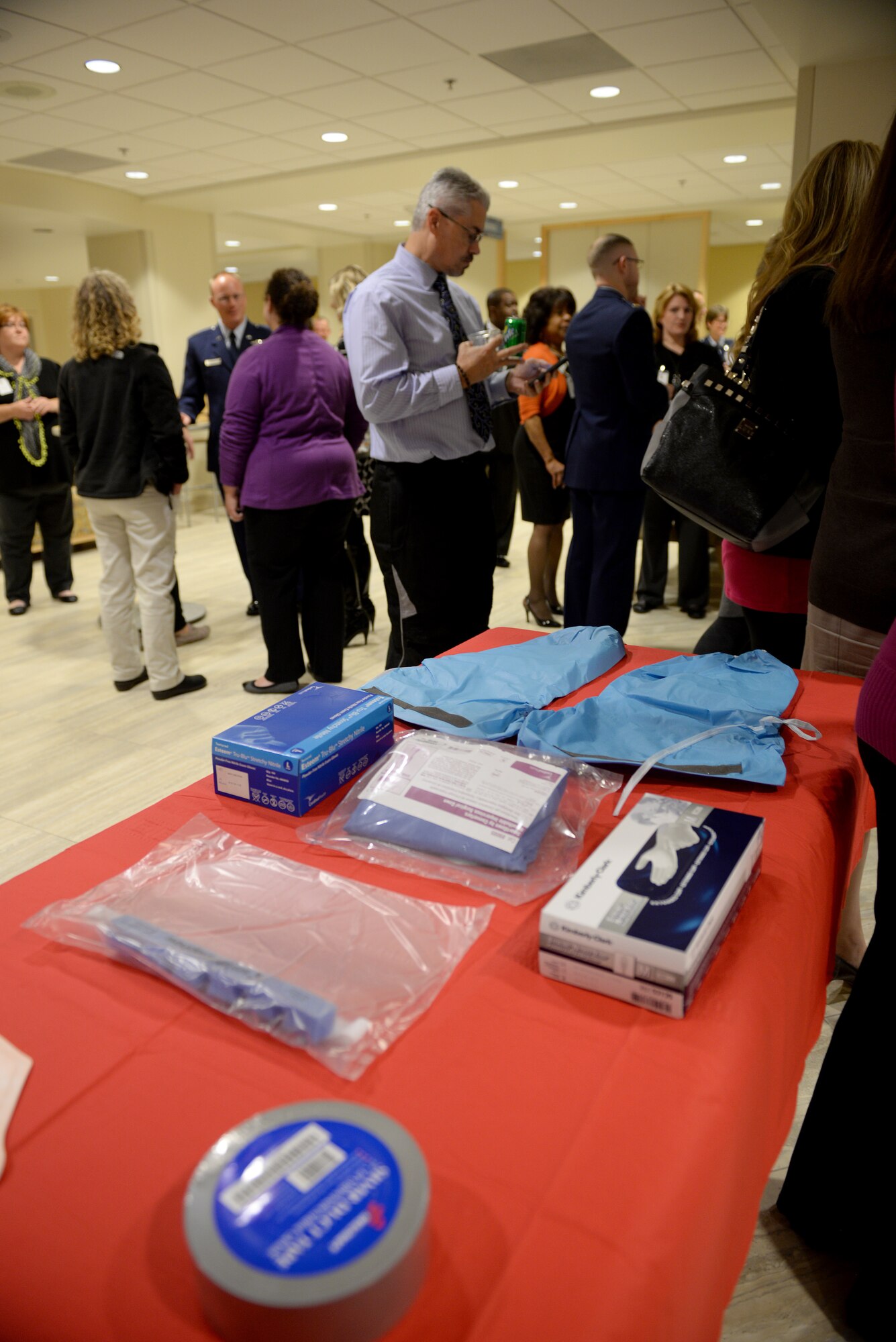 Equipment that would be used during an encounter with severe illnesses such as Ebola are displayed during the 3rd Annual Network Provider’s Social, Scott AFB, Ill., Nov. 6, 2014. Provider representatives gathered from the local area to tour the capabilities of the Scott Air Force Base Clinic. The social’s intention is also to provide a venue for off-base providers and the 375th Medical Group to foster a working relationship, making off-base care for beneficiaries a smoother process. (U.S. Air Force photo by Airman 1st Class Erica Crossen)