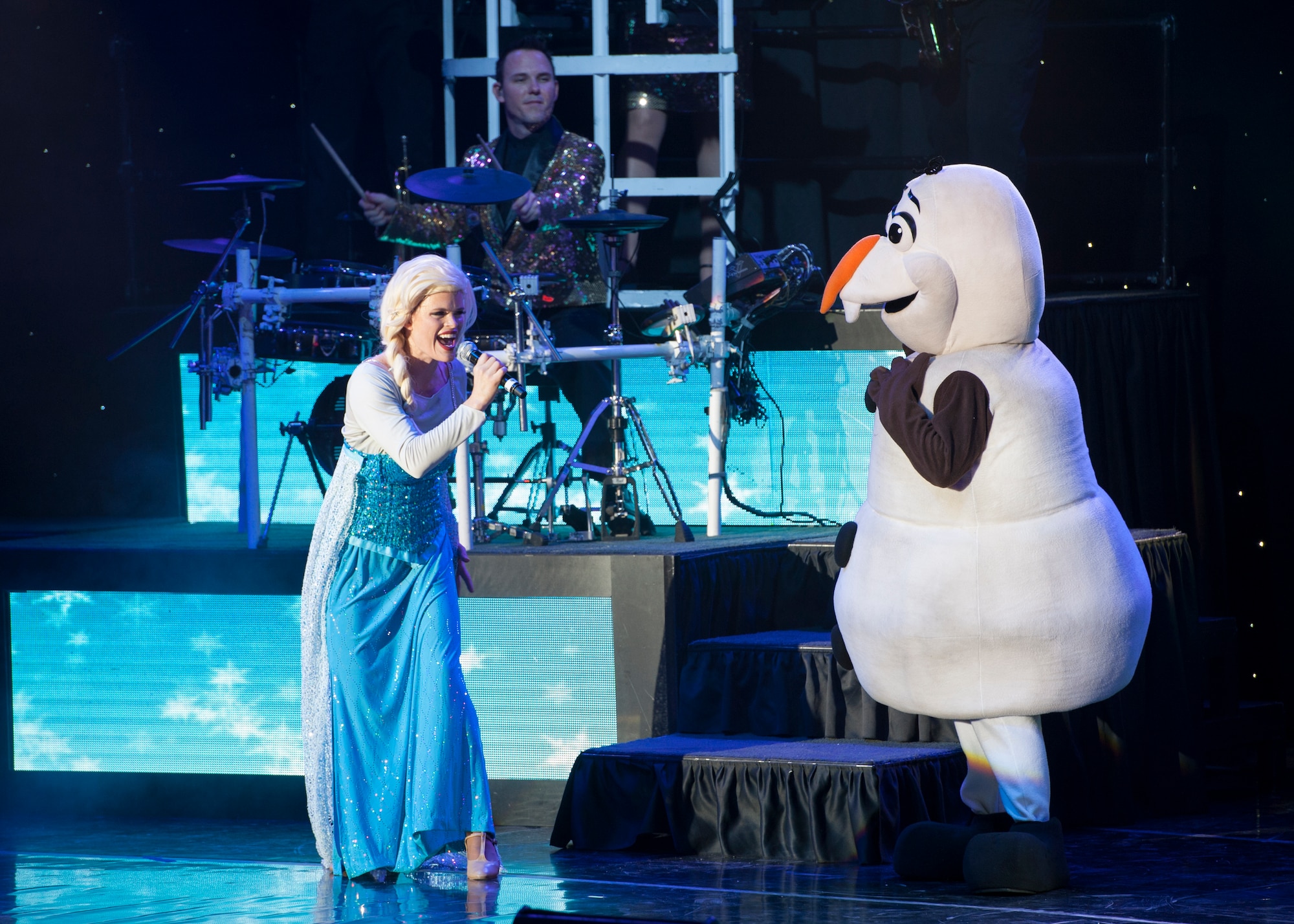 First Lt. Amanda Bills, 707th Force Support Squadron personnel officer, sings during a Tops in Blue show Nov. 18, 2014, at the Delaware State University in Dover, Del. The best Airmen are selected from throughout the Air Force to tour with Tops in Blue. (U.S. Air Force photo/Airman 1st Class Zachary Cacicia)
