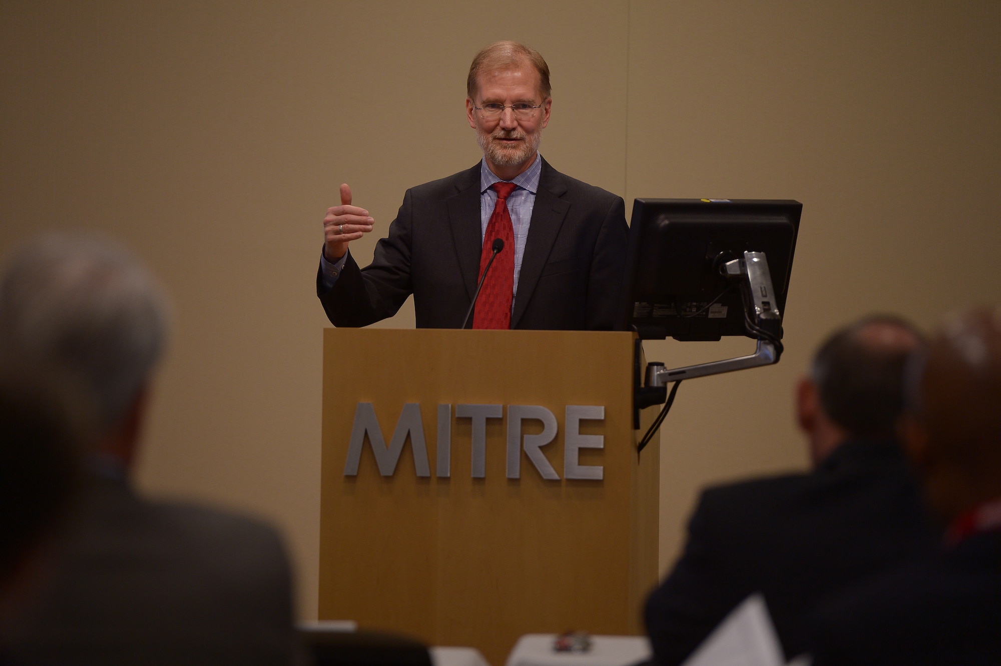 Steven Wert, Battle Management program executive officer, at Hanscom Air Force Base, discusses how current cyber developments can affect Air Force operations during a conference at the MITRE Corporation complex in Bedford, Mass., Nov. 13, 2014. The “Cyber Challenges and Solutions: Today and Tomorrow” conference brought together officials from the military, other government agencies and the private sector with the goal of discussing current cyber trends.  (U.S. Air Force photo by Jerry Saslav)