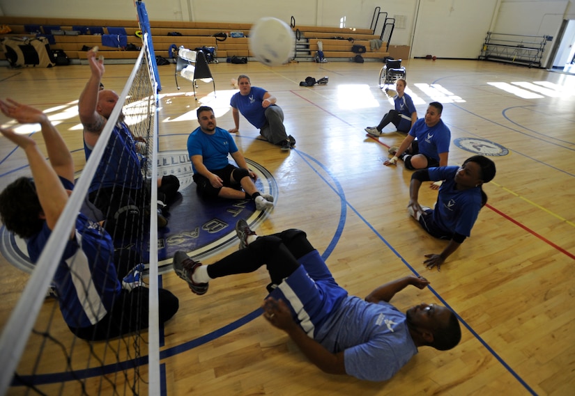 Air Force wounded, ill or injured warriors practice at the Joint Base Andrews West Fitness Center, Nov. 18, for an upcoming Pentagon Sitting Volleyball Tournament. The one-day tournament is designed to bring awareness to the challenges of the wounded, ill or injured population. (U.S. Air Force photo/Tech. Sgt. Brian Ferguson)