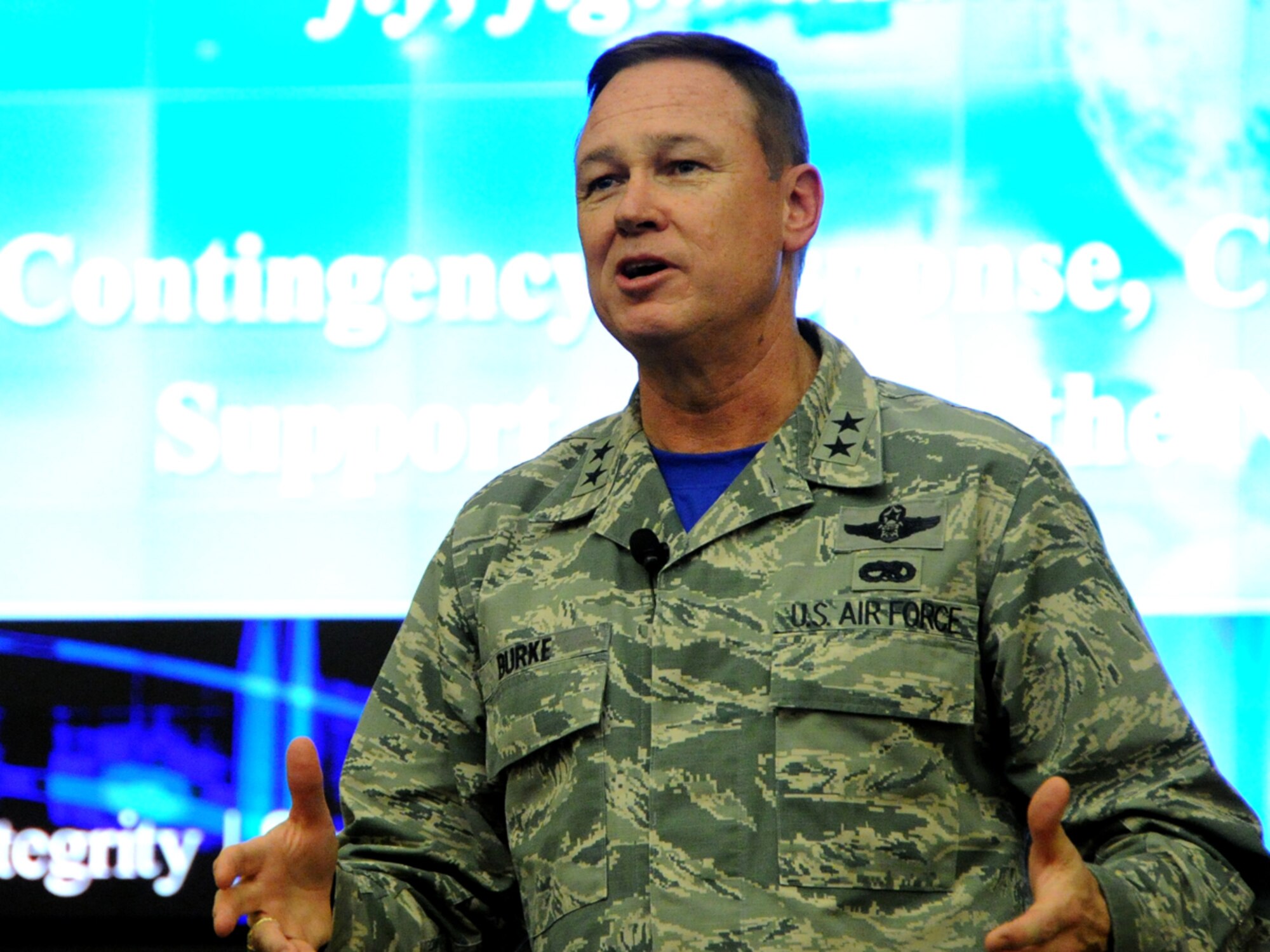 Maj. Gen. Darryl Burke, Air Force District of Washington commander, speaks to members of the AFDW staff during his first commander’s call at Joint Base Andrews, Md., Oct. 24, 2014. Burke established an email hotline providing away for members of his command to bring him their questions and concern when they are unable to resolve an issue through normal channels. (U.S. Air Force photo/Staff Sgt. Matthew Davis)