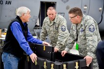 Edward Stone, a program manager with MACRO Industries, LLC., instructs Master Sgt. Ed Shaffer, an aircraft maintenance craftsman, and Master Sgt. Ken Younkins, an aircraft work inspector, both with the 910th Maintenance Group, on a new armor plating system installed on a Youngstown C-130 Hercules the week of Nov. 2. Youngstown is the second base to receive a test version of the new system, designed for easier and more secure installation and better protection for aircrew members. (U.S. Air Force photo/Eric M. White)