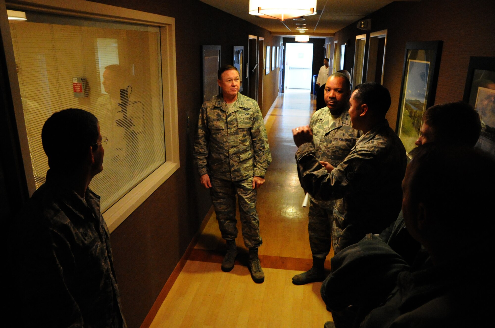 Airmen from the Warfighter Eye Center at Malcom Grow Medical Center brief Major Generals Darryl Burke, Air Force District of Washington commander, and Roosevelt Allen, 79th Medical Wing commander at Joint Base Andrews, Md., Nov. 18, 2014. Burke visited medical facilities and met staff during his 779th Medical Group immersion tour. (U.S. Air Force photo/Staff Sgt. Matt Davis)
