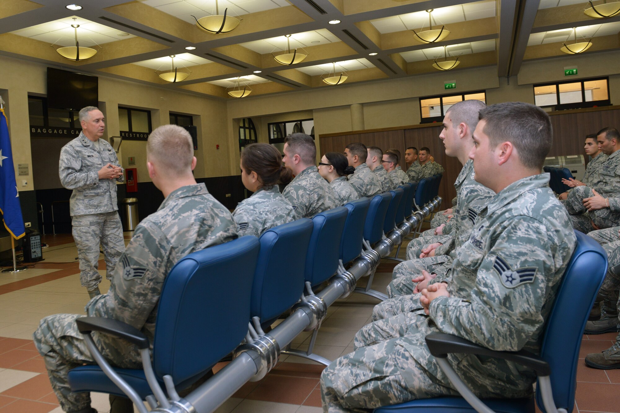 Maj. Gen. Frederick Martin, U.S. Air Force Expeditionary Center commander, speaks to 724th Air Mobility Squadron Airmen during an all-call, Nov. 19, 2014, at Aviano Air Base, Italy. Martin toured the AMS facilities and congratulated the unit for receiving Small Terminal of the Year from the 521st Air Mobility Operations Wing, Ramstein Air Base, Germany. (U.S. Air Force photo/Airman 1st Class Ryan Conroy) 