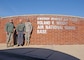 Retired Air Force Brig. Gen. Roland R. Wright (center) stands with Brig. Gen. David Fountain, Assistant Adjutant General for Air, Utah National Guard (left), and Maj. Gen. Jefferson Burton, Adjutant General of the Utah National Guard (right), during a ceremony to rename the Utah Air National Guard Base in his honor held in Salt Lake City, Utah on Nov. 18, 2014. Wright, a combat pilot with a distinguished military career spanning more than three decades served as Utah's first Chief of Staff for Air. (Air National Guard photo by Staff Sgt. Annie Edwards/RELEASED)