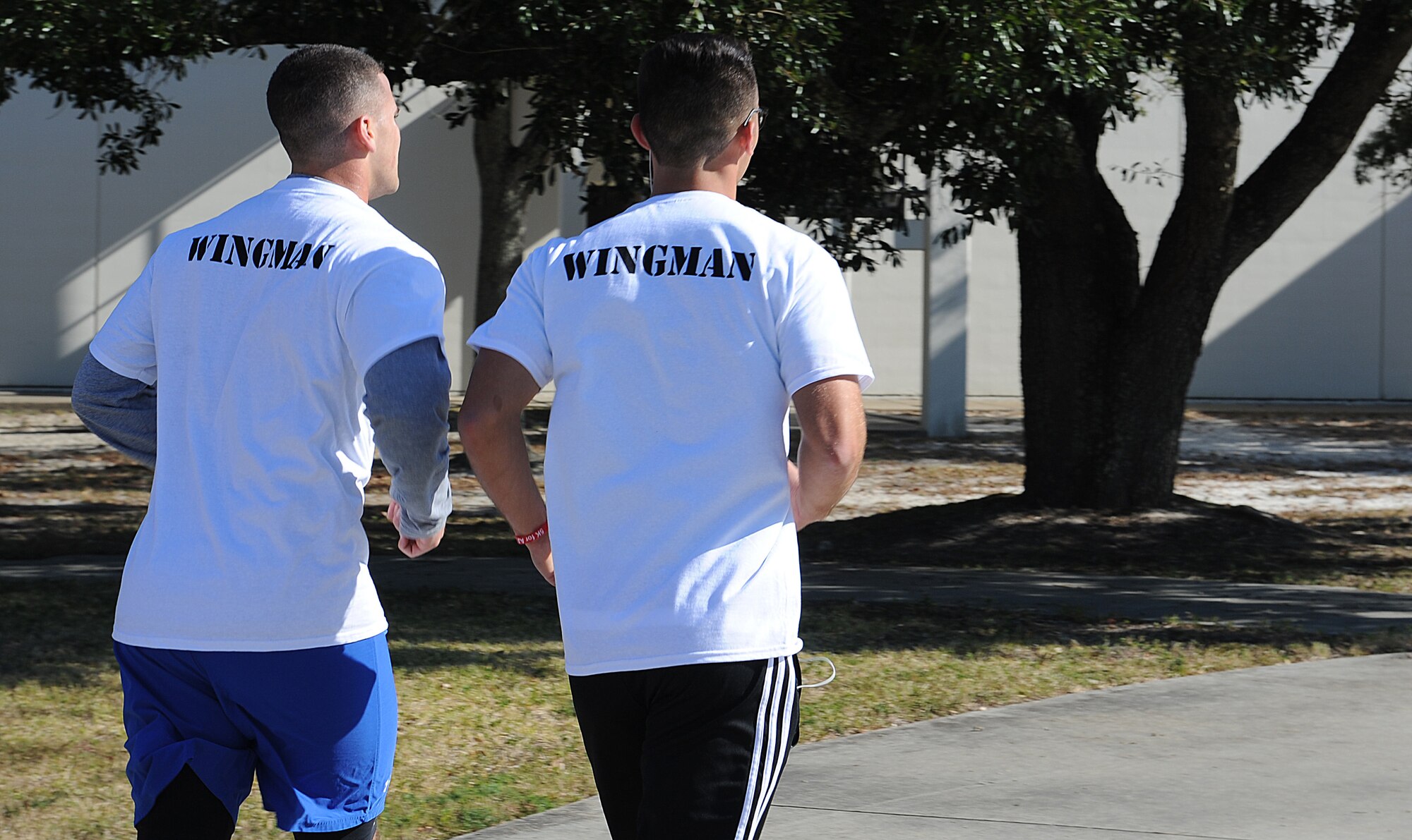 Participants run during the second annual 5K for AJ Nov. 15, 2014, Keesler Air Force Base, Miss. The event raised more than $5,000 for the Disabled American Veterans Charity and drew approximately 300 participants. (U.S. Air Force photo by Senior Airman Holly Mansfield/Released)