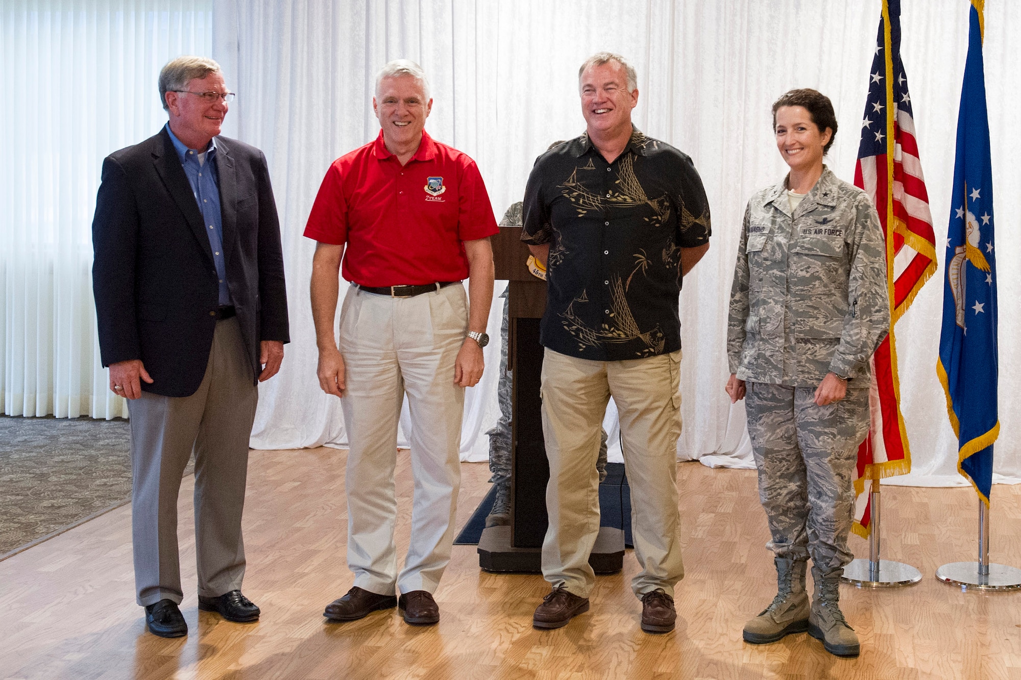 (left to right) Retired Brig. Gen. Dan Goodrich, retired Lt. Gen. William Welser III, retired Brig. Gen. James Carroll, and Brig. Gen. Nina Armagno, 45th Space Wing commander, pose for a photo during the Bars to Stars Symposium at Patrick Air Force Base, Fla., Nov. 14, 2014. The goal of the symposium is to advocate well-rounded Air Force professionals, share knowledge and advice from leaders based on Air Force career experiences. (U.S. Air Force photo/Matthew Jurgens) (Released)
