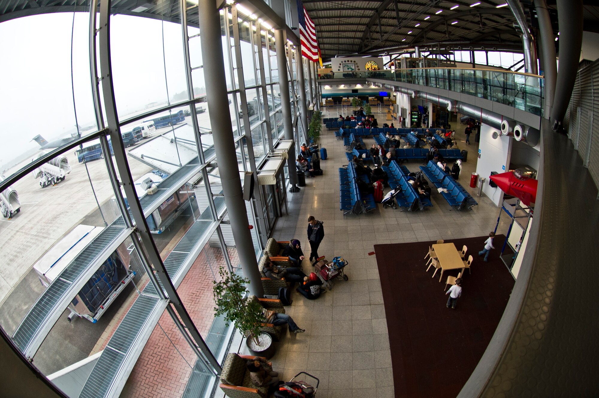 Passengers await the arrival of space available flights to different destinations around the world at the Ramstein Air Base Passenger Terminal. With summer about to start, travelers may find it hard to catch a flight. With the required documentations and help from PAX terminal Airmen, commuting to different locations can be a breeze. (U.S. Air Force photo/Airman 1st Class Jordan Castelan)