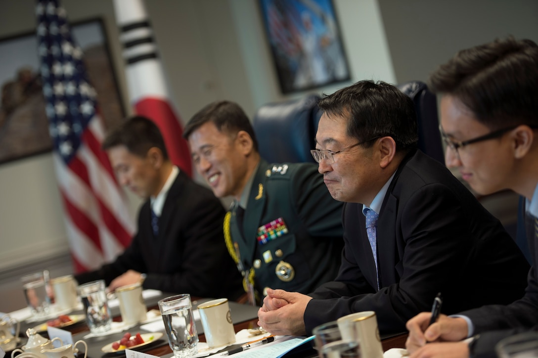 South Korean Vice Defense Minister Baek Seung-joo, second from right, meets with U.S. Deputy Defense Secretary Bob Work, not pictured, at the Pentagon, Nov. 19, 2014. 