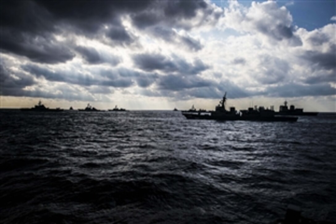 U.S. Navy and Japan Maritime Self-Defense Force ships transit in formation during the conclusion of exercise Keen Sword 15 in the water south of Japan, Nov. 19, 2014.