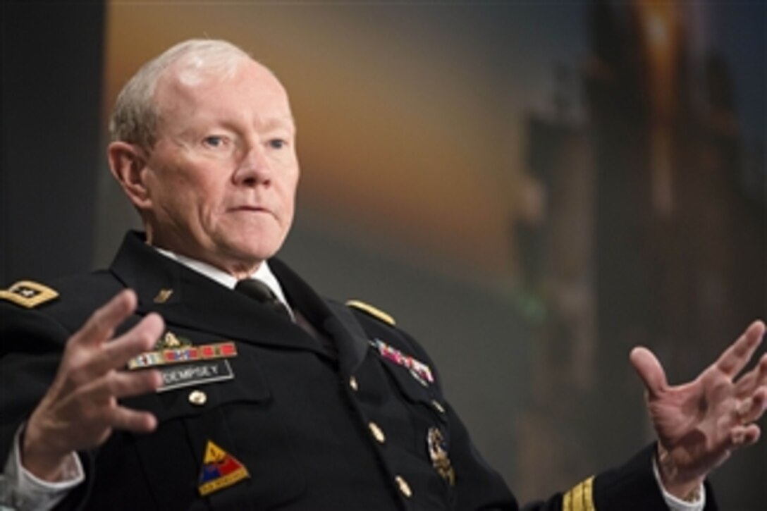 Army Gen. Martin E. Dempsey, chairman of the Joint Chiefs of Staff, answers questions during the Defense One Summit in Washington, D.C., Nov. 19, 2014. The discussion, hosted by Kevin Baron, executive editor of Defense One, an online publication, covered topics related to the purpose of today's military and national security.