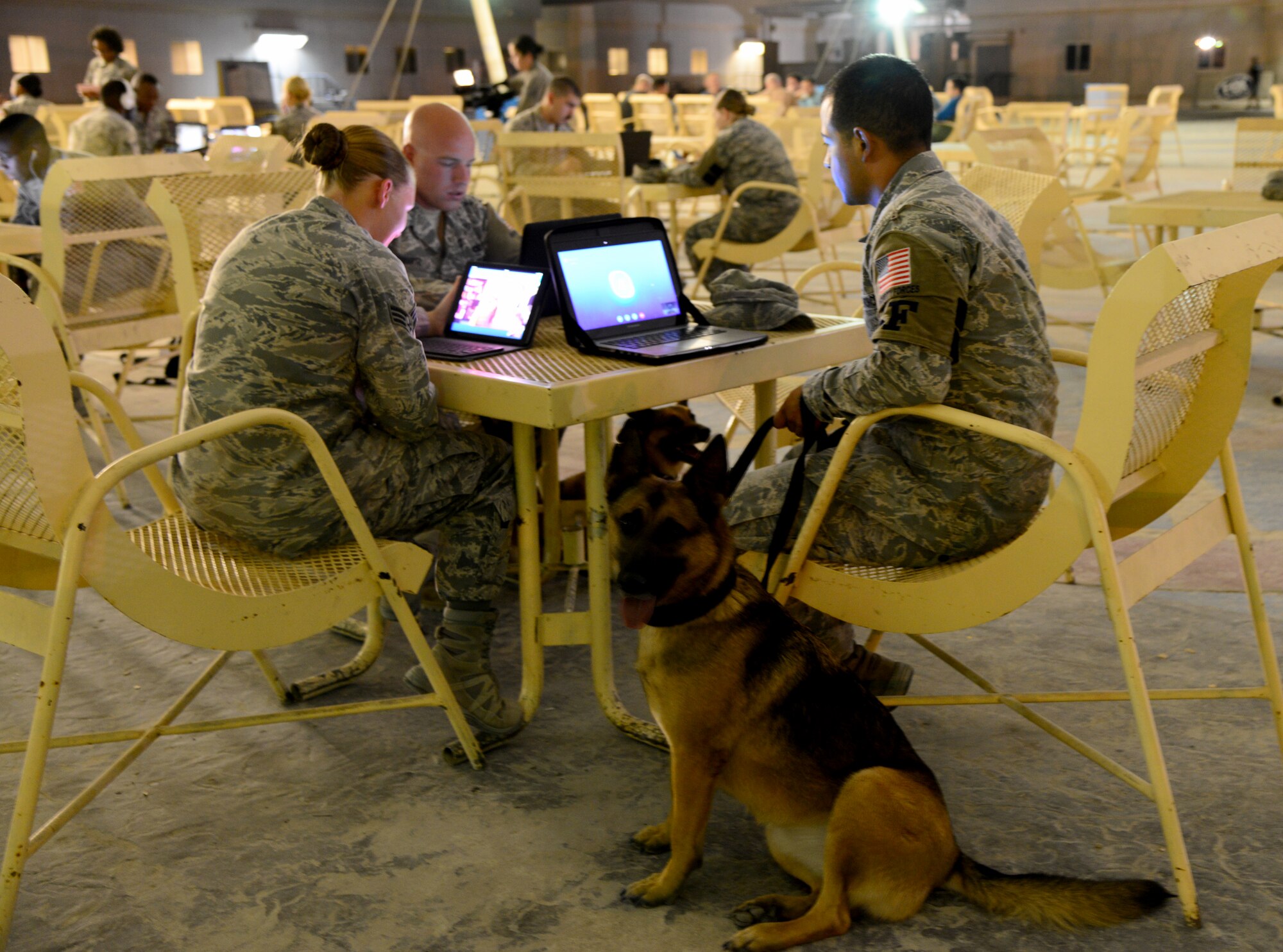 U.S. Air Force Airmen from the 379th Expeditionary Security Forces Squadron participate in the “Holler at a Hero” project, Nov. 13, 2014, at Al Udeid Air Base, Qatar. The “Holler at a Hero” project was held in recognition of Veteran’s Day by a Security Forces veteran named James Wilson, who is now a teacher in New Jersey. The project allowed Wilson’s fifth grade class to have face-to-face interaction, via online video-messaging, with deployed armed forces members to discuss their job duties, day-to-day activities and any personal challenges military members face while deployed. (U.S. Air Force photo by Senior Airman Kia Atkins)