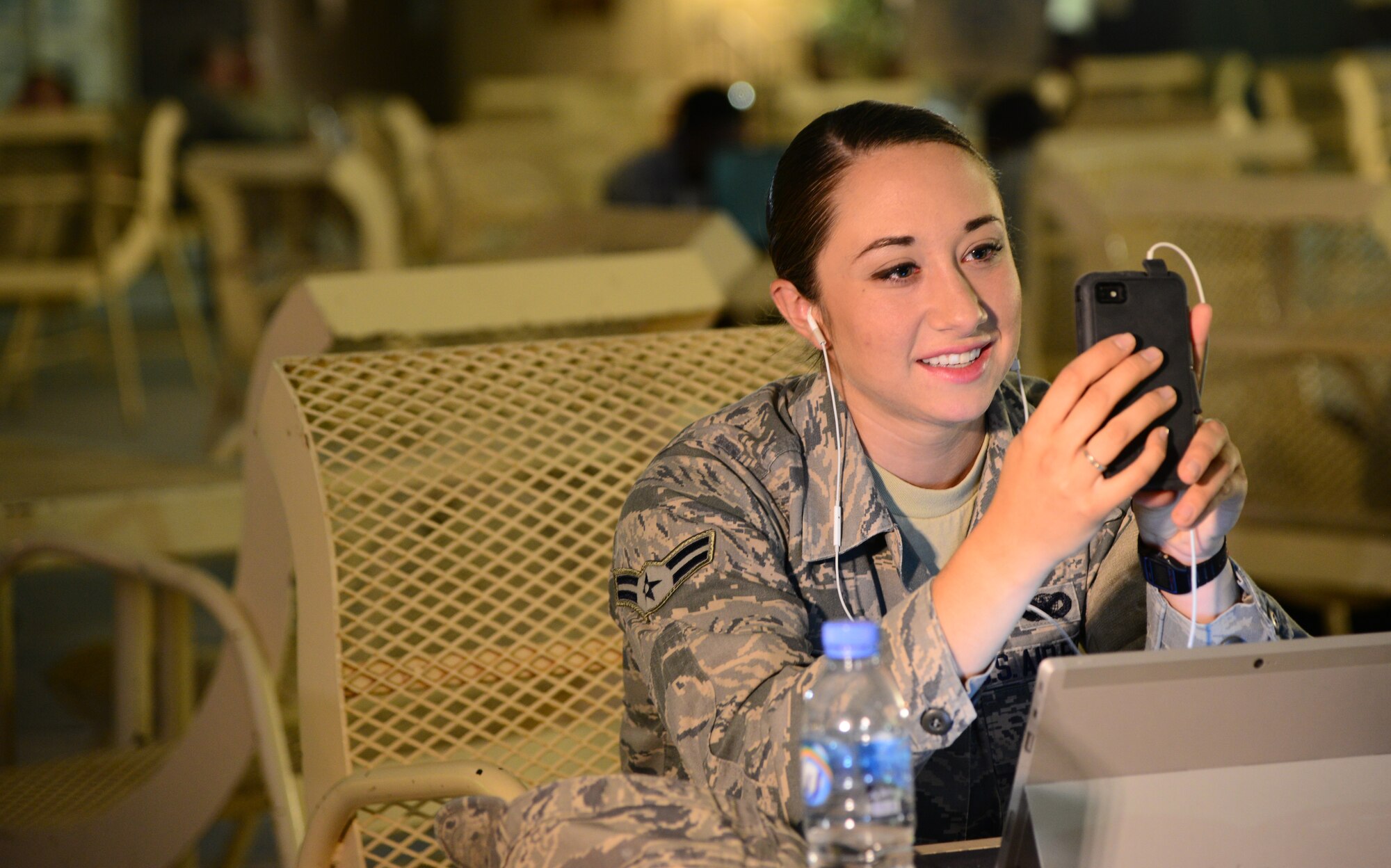 U.S. Air Force Airman 1st Class Cassie Starr, 379th Expeditionary Security Forces Squadron, video-chats with a fifth grade student during the “Holler at a Hero” project Nov. 13, 2014, at Al Udeid Air Base, Qatar. The “Holler at a Hero” project was held in recognition of Veteran’s Day by a Security Forces veteran named James Wilson, who is now a teacher in New Jersey. The project allowed Wilson’s fifth grade class to have face-to-face interaction, via online video-messaging, with deployed servicemembers to discuss their job duties, day-to-day activities and any personal challenges military members face while deployed. (U.S. Air Force photo by Senior Airman Kia Atkins)