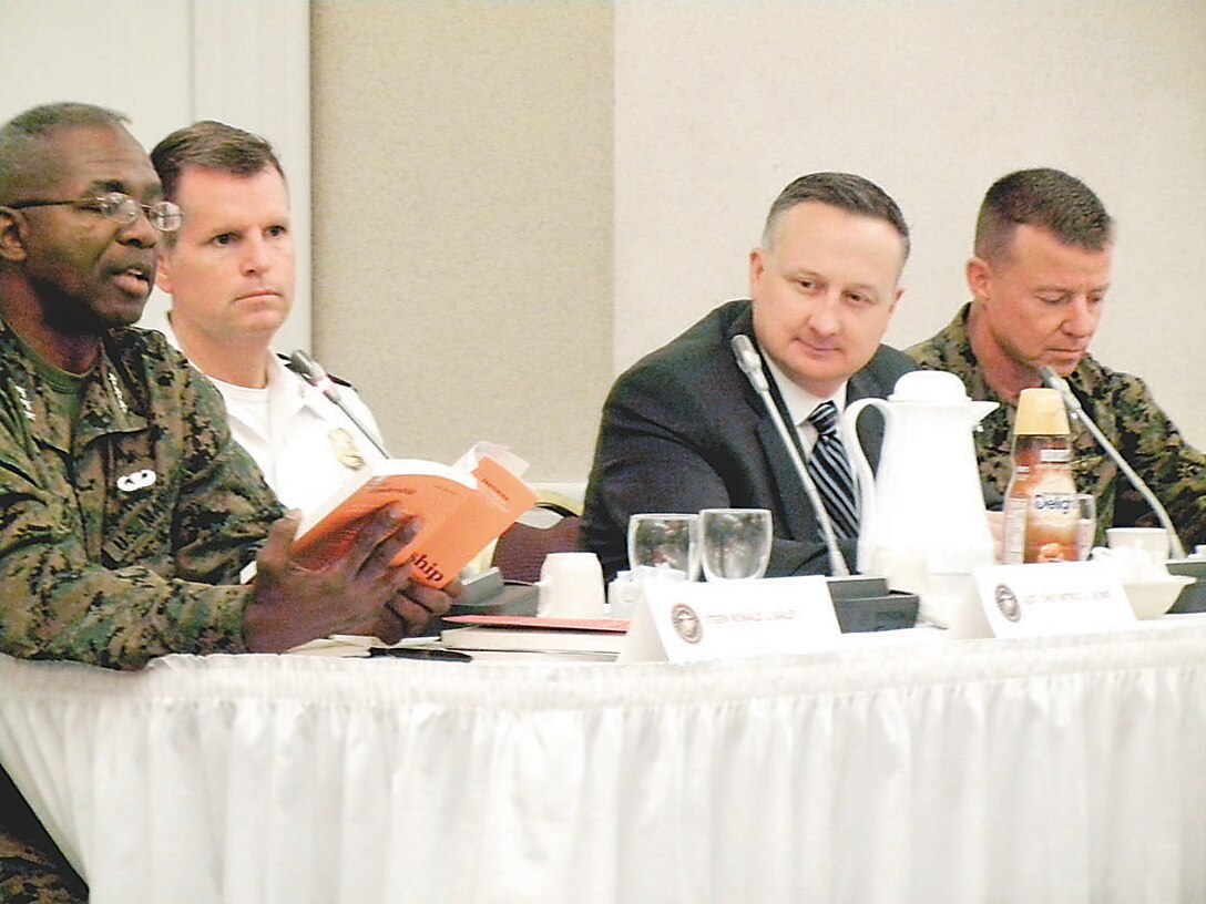 Lt. Gen. Ronald L. Bailey, deputy commandant for plans, policies and operations; Patrick A. Burke, assistant chief, Washington, D.C. Police Department; Zachary T. Lowe Jr., section chief, FBI Academy; and Col. Allen D. Broughton, chief of staff, Marine Corps National Capital Region/Marine Corps Base Quantico speak during the U.S. Marine Corps Leadership Roundtable held at The Clubs at Quantico on Nov. 13.
