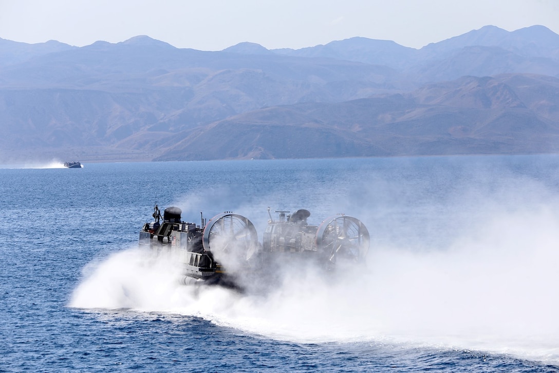 U.S. Navy landing craft air cushions with Assault Craft Unit 5 (ACU-5), Beachmaster Unit 1, conduct runs during the retrieval of equipment and troops as part of a retrograde from D’Arta Plage, Djibouti, Nov. 16. Marines from the 11th MEU are deployed with the San Diego as a part of the Makin Island Amphibious Ready Group as a flexible, adaptable and persistent force in the U.S. 5th Fleet area of responsibility. 