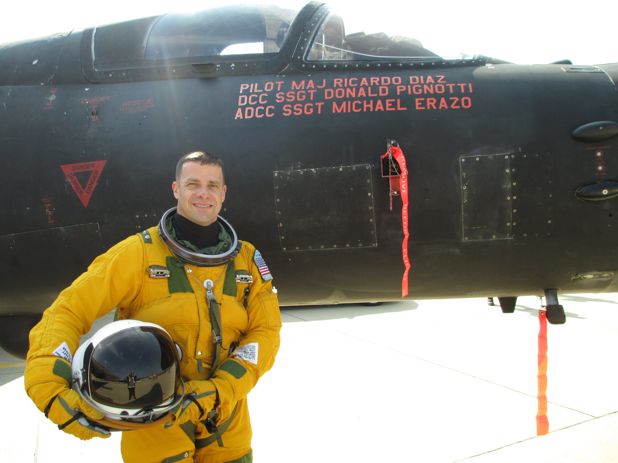 Maj. Ricardo Diaz, then 5th Reconnaissance Squadron director of operations, poses in front of his U-2 aircraft at Osan Air Base, Republic of Korea. Diaz and the 5th RS commander Lt. Col. Luke Lokowich were recently selected by the Air Force Association as the best reconnaissance crew in the Air Force and bestowed the Gen. Jerome O'Malley Award. (U.S. Air Force photo by Master Sgt. Marelise Wood) 
