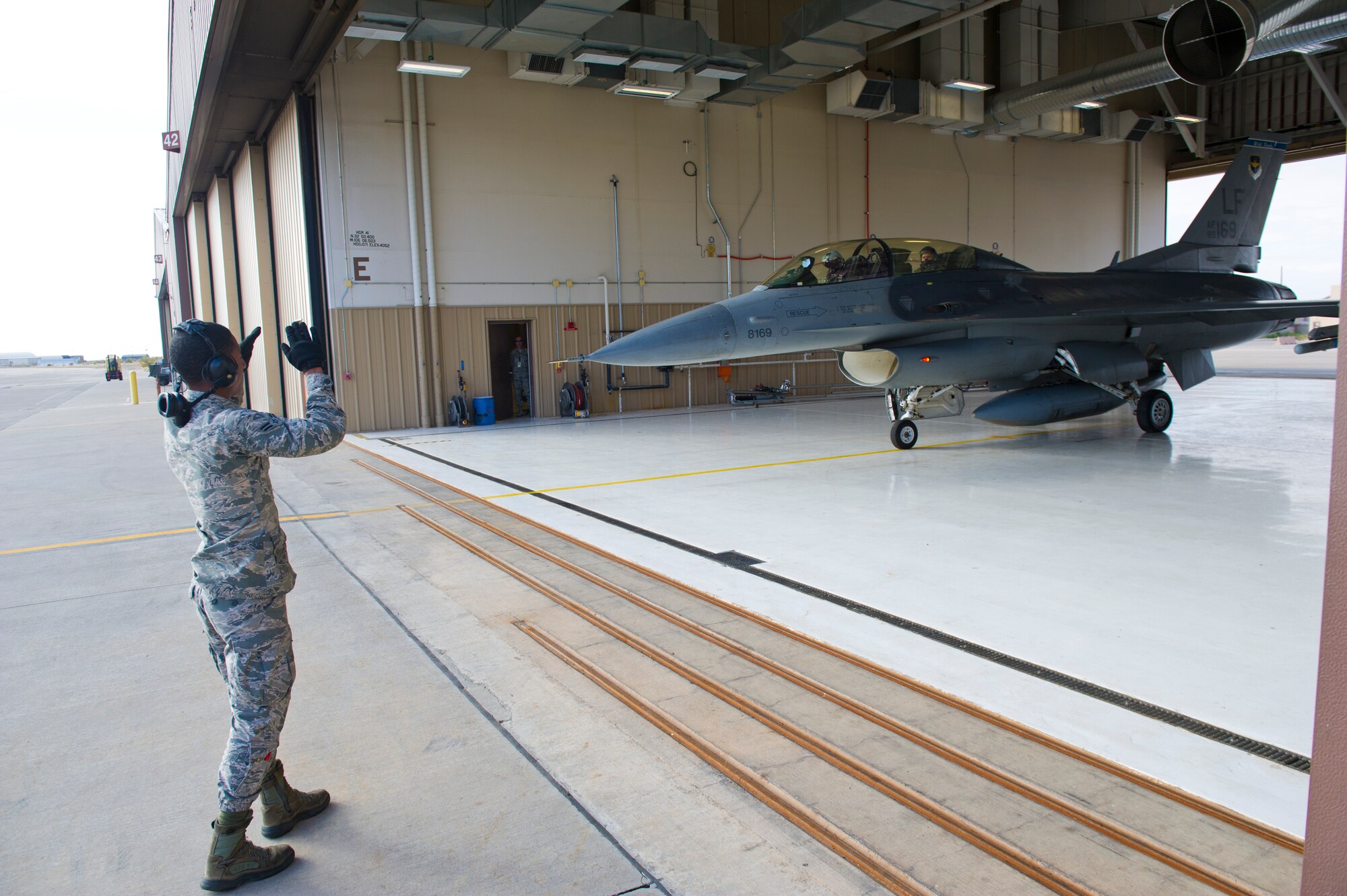 Lt. Col. Jerod Rick, 54th Fighter Group chief of standardization and evaluation and 1st Lt. Taylor Roberts, a Basic Course student in the 311th Fighter Squadron, prepare to taxi out in an F-16 Fighting Falcon at Holloman Air Force Base, N.M., Nov. 13. Roberts became the first F-16 Basic Course student to get airborne in the jet at Holloman. It was his first of 57 planned flights in his syllabus. (U.S. Air Force photo by Senior Airman Daniel E. F. Liddicoet/Released)