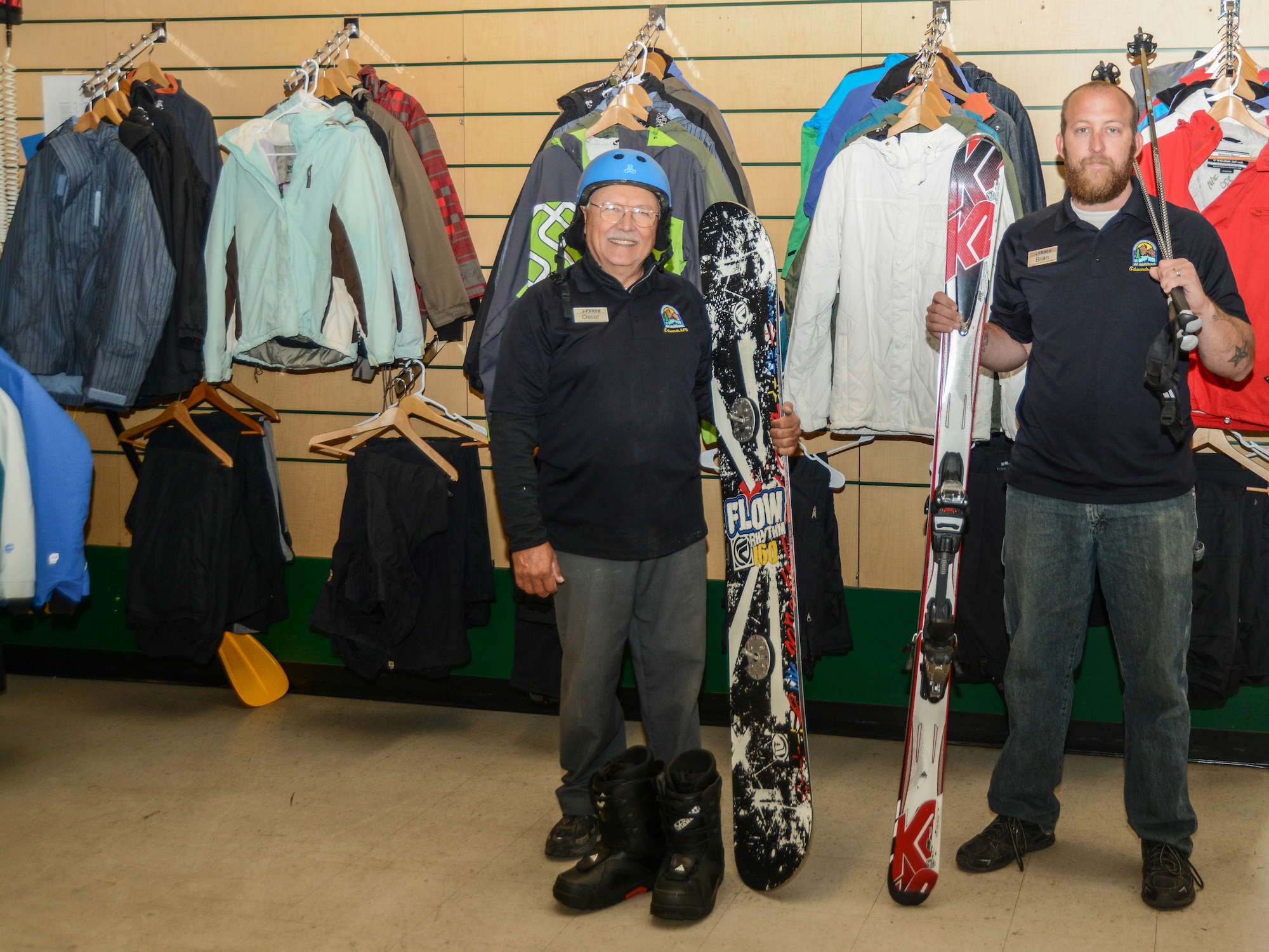 Outdoor Recreation employees Brian Brazelton (right) and Oscar Parra-Garcia (left) are ready to help with all the equipment needed for a day on the slopes. (U.S. Air Force photo by Rebecca Amber)