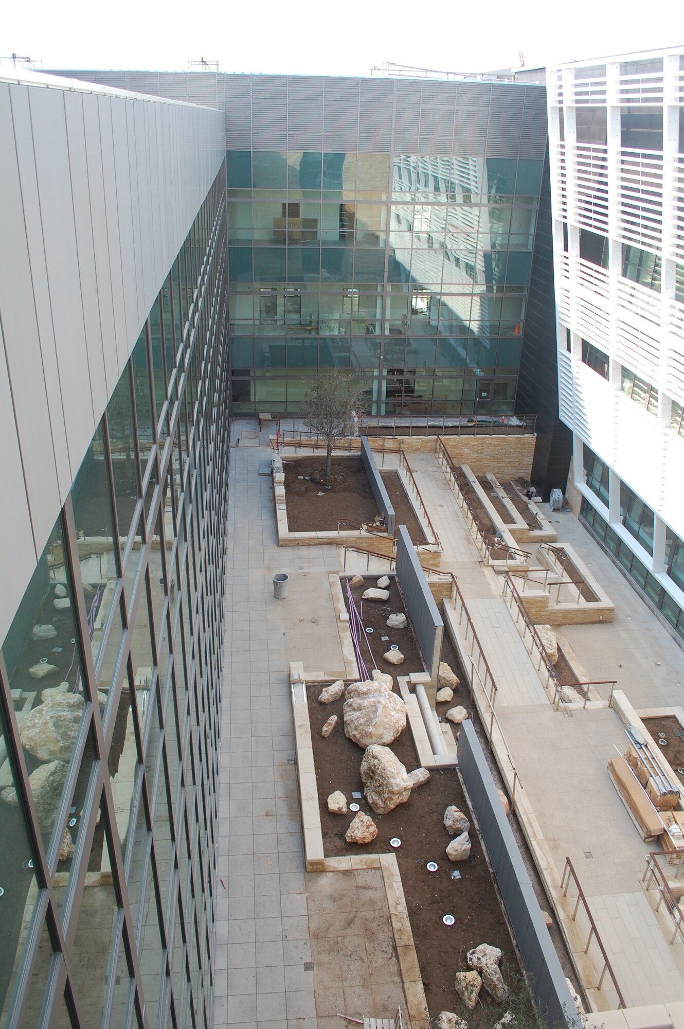 Construction continues on the new $380 million Wilford Hall Ambulatory Surgical Center, the largest outpatient ambulatory care center in the Department of Defense. Gardens and natural light are prominent throughout the facility, to help provide a healing and calming environment. (U.S. Air Force photo/Jennifer Schneider/released)