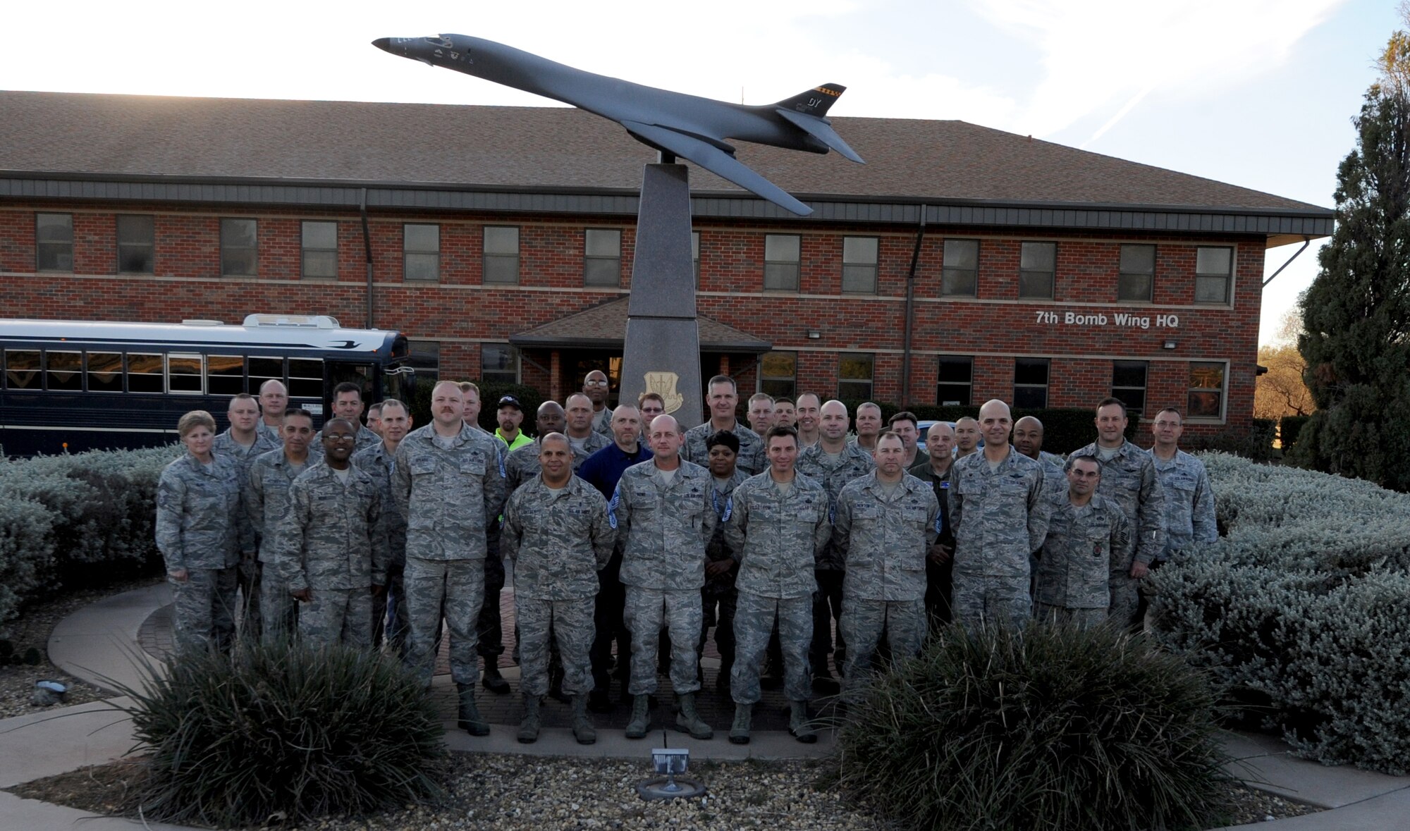 The latest Chief selects stand outside with their leadership at the 7th Bomb Wing headquarters building after being notified of their selection at Dyess Air Force Base, Texas.  A total of six Airmen were selected for the highest enlisted rank. (Courtesy photo)