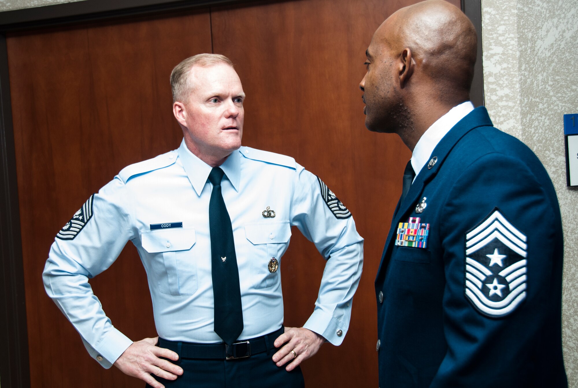 Chief Master Sgt. of the Air Force James A. Cody talks with Chief Master Sgt. Cameron Kirksey, Air Force Reserve Command command chief, at Dobbins Air Reserve Base, Ga., Nov. 17, 2014. Cody came to Dobbins to visit the Atlanta Regional Military Appreciation Committee in Marietta, Georgia for its 62nd annual luncheon. (U.S. Air Force photo by Senior Airman Daniel Phelps/Released)