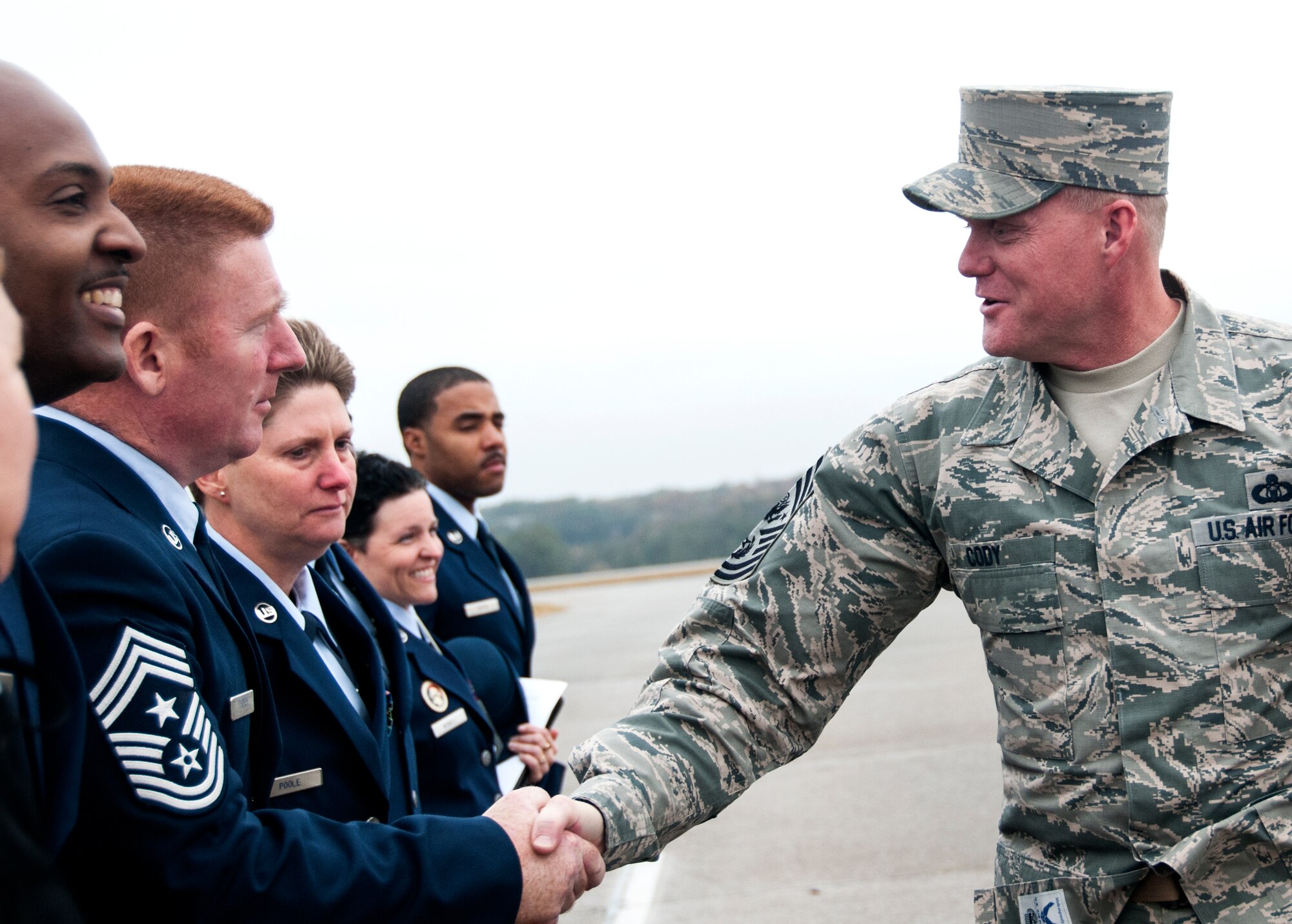 Chief Master Sgt. of the Air Force James A. Cody greets Air Force Reservists on the flightline of Dobbins Air Reserve Base, Ga. prior to his speaking engagement with the Atlanta Regional Military Appreciation Committee Nov. 17, 2014. Cody visited the ARMAC in Marietta, Georgia for its 62nd annual luncheon. (U.S. Air Force photo by Senior Airman Daniel Phelps/Released)