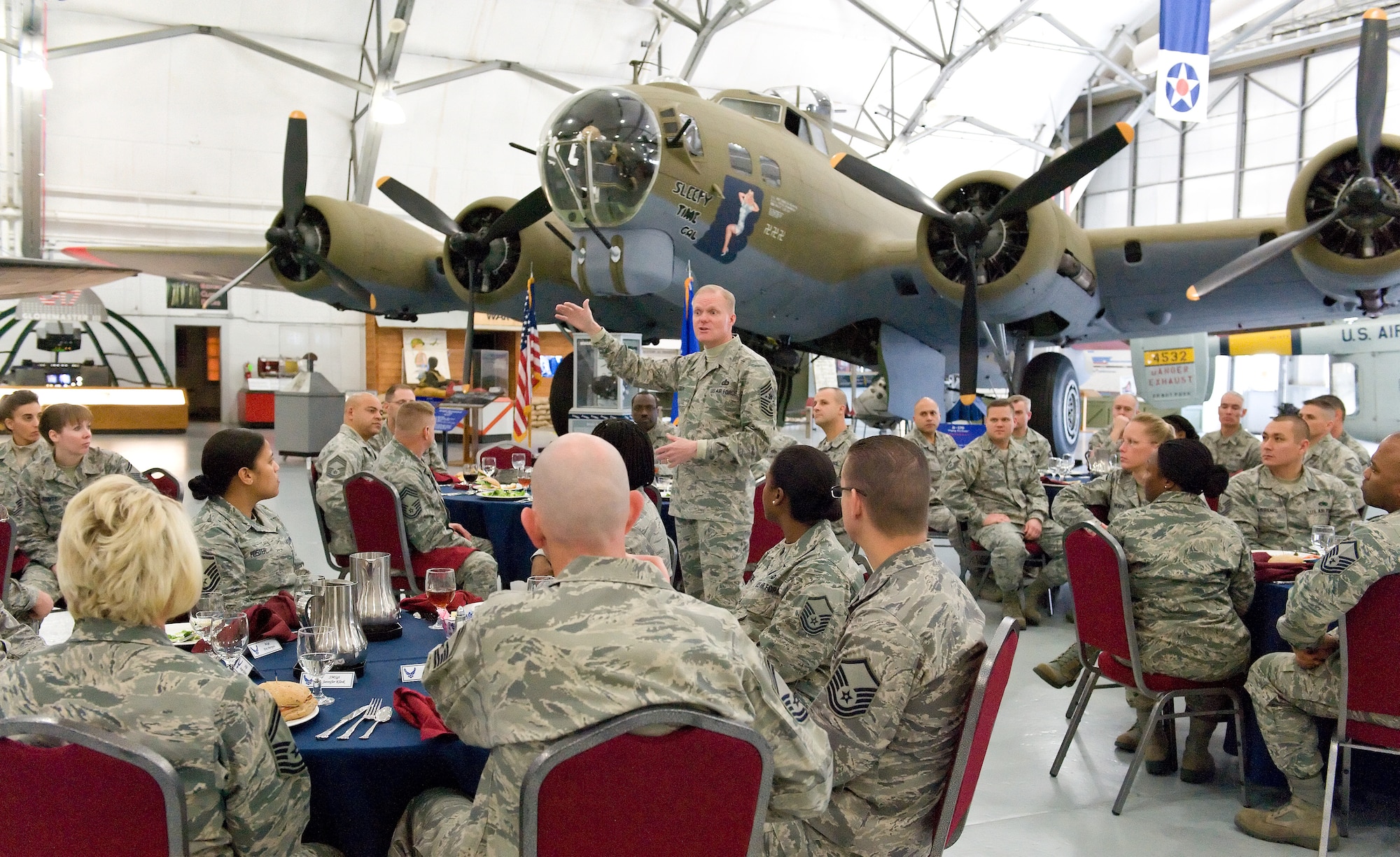 Chief Master Sgt. of the Air Force James Cody speaks to Team Dover senior noncommissioned officers prior to having lunch Nov. 18, 2014, at the Air Mobility Command Museum on Dover Air Force Base, Del. Cody spoke on numerous topics pertaining to Air Force personnel and opened to floor to questions. (U.S. Air Force photo/Roland Balik)