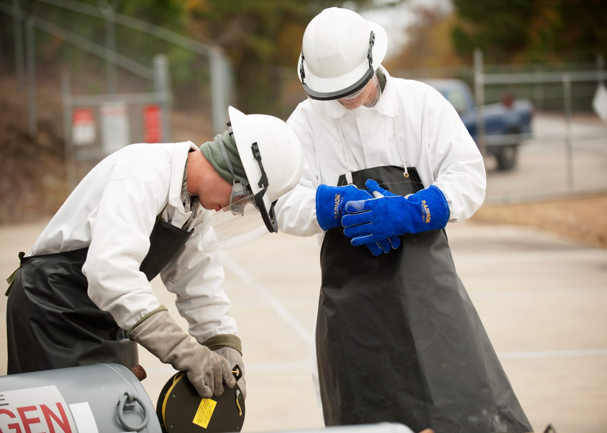 Senior Airman Richard Hayes, a 19th Logistics Readiness Squadron fuels facility operator, shuts off the fill valve on a liquid oxygen tank Nov. 13, 2014, at Little Rock Air Force Base, Ark. If hydrocarbons such as oil and other petroleum products come into contact with the liquid oxygen, it could result in a violent or potentially explosive reaction. (U.S. Air Force photo by Airman 1st Class Scott Poe) 