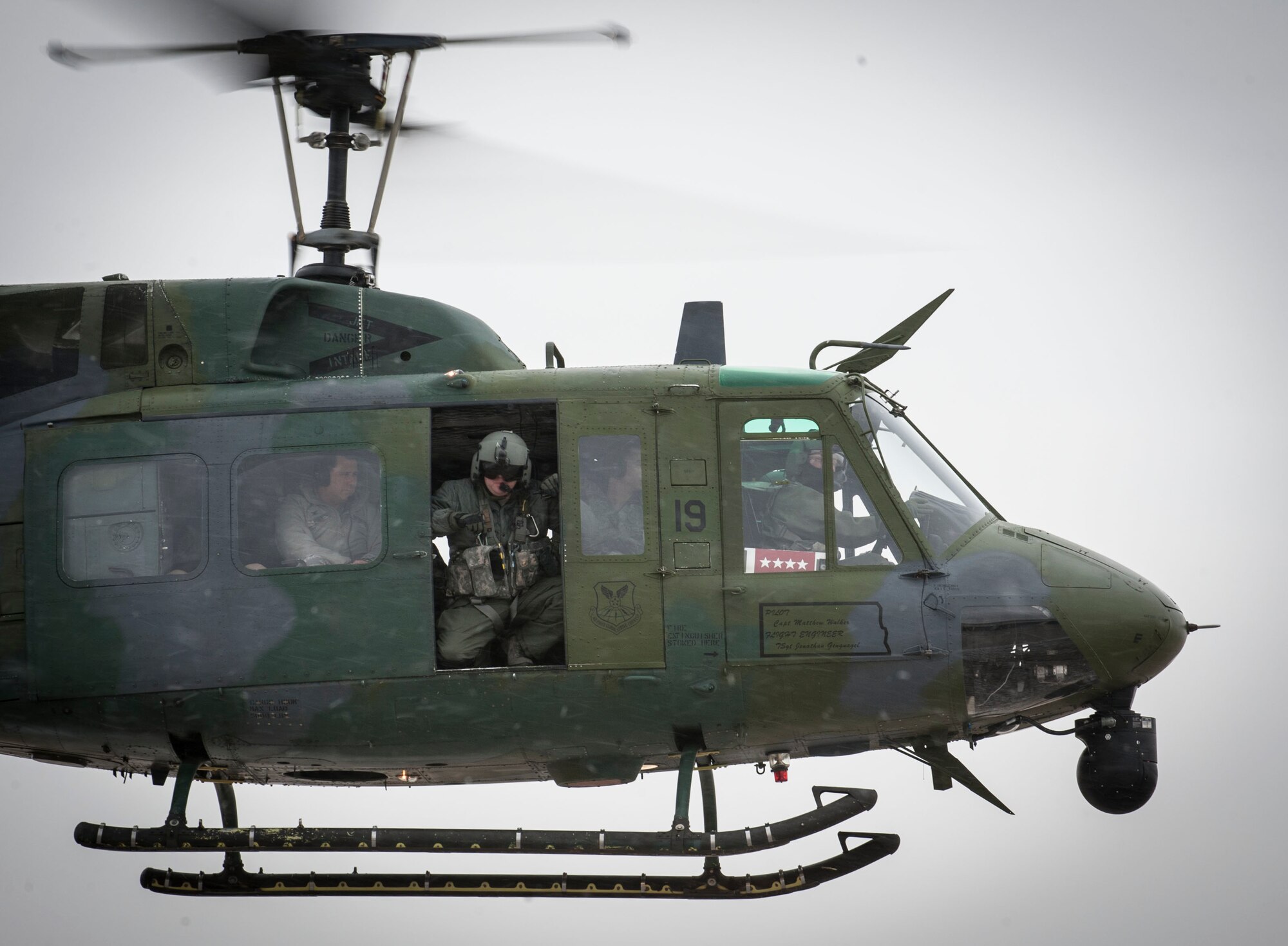 A UH-1 helicopter carrying Adm. Cecil D. Haney, U.S. Strategic Command (USSTRATCOM) commander, takes off from Minot Air Force Base, N.D., Nov. 17, 2014. As part of his ongoing series of visits with nuclear deterrent forces personnel, Haney traveled to the missile field to tour a site and view a demonstration. The 5th Bomb Wing and 91st Missile Wing at Minot support USSTRATCOM’s nuclear deterrence mission set by operating and maintaining both B-52 Stratofortress bombers and Minuteman III intercontinental ballistic missiles. (U.S. Air Force photo by Senior Airman Stephanie Morris)