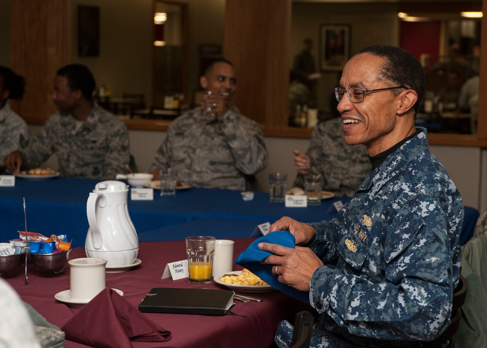 Adm. Cecil D. Haney, U.S. Strategic Command (USSTRATCOM) commander, eats breakfast with Airmen from the 5th Bomb Wing and 91st Missile Wing at Minot Air Force Base, N.D., Nov. 17, 2014. As part of his ongoing series of visits with nuclear deterrent forces personnel, Haney discussed the Airmen’s goals with them and listened to stories about their reasons for joining the Air Force. The 5th Bomb Wing and 91st Missile Wing support USSTRATCOM’s strategic deterrence mission set by operating and maintaining both B-52 Stratofortress bombers and Minuteman III intercontinental ballistic missiles. (U.S. Air Force photo by Senior Airman Stephanie Morris)