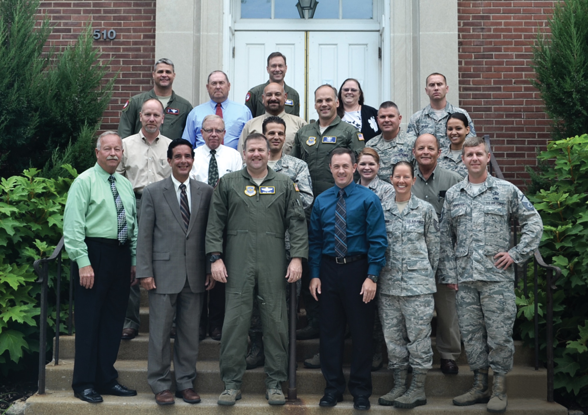 Left to right, front row: Joe Hughes, Dave Miller, Col Michael Seiler, Chris Davis, TSgt Angela Pedro, and MSgt Jeremiah Carpenter. Second row: Michael Wahler, Pat Nevitt, MSgt Humberto Marchese, MSgt Lisa Jones, and Harry Lasell. Third row: Lt Col John Ourada, Wayne Bendall, Lalo Maynes, Lt Col Pete Kelley, CMSgt Michael Wilson, and TSgt Camille Moore. Fourth row: Col Mark Hale, Ida Mills, and MSgt Chad Grady. Not pictured: Lt Col Chris Buschur, Lt Col Ken Picha, Maj Scott Kulle, MSgt Allison Brown, TSgt Byron Allen, Mr. Roberto Aguilar, Mr. Steve Panger, and Ms. Jen Yates.