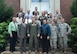 Left to right, front row: Joe Hughes, Dave Miller, Col Michael Seiler, Chris Davis, TSgt Angela Pedro, and MSgt Jeremiah Carpenter. Second row: Michael Wahler, Pat Nevitt, MSgt Humberto Marchese, MSgt Lisa Jones, and Harry Lasell. Third row: Lt Col John Ourada, Wayne Bendall, Lalo Maynes, Lt Col Pete Kelley, CMSgt Michael Wilson, and TSgt Camille Moore. Fourth row: Col Mark Hale, Ida Mills, and MSgt Chad Grady. Not pictured: Lt Col Chris Buschur, Lt Col Ken Picha, Maj Scott Kulle, MSgt Allison Brown, TSgt Byron Allen, Mr. Roberto Aguilar, Mr. Steve Panger, and Ms. Jen Yates.