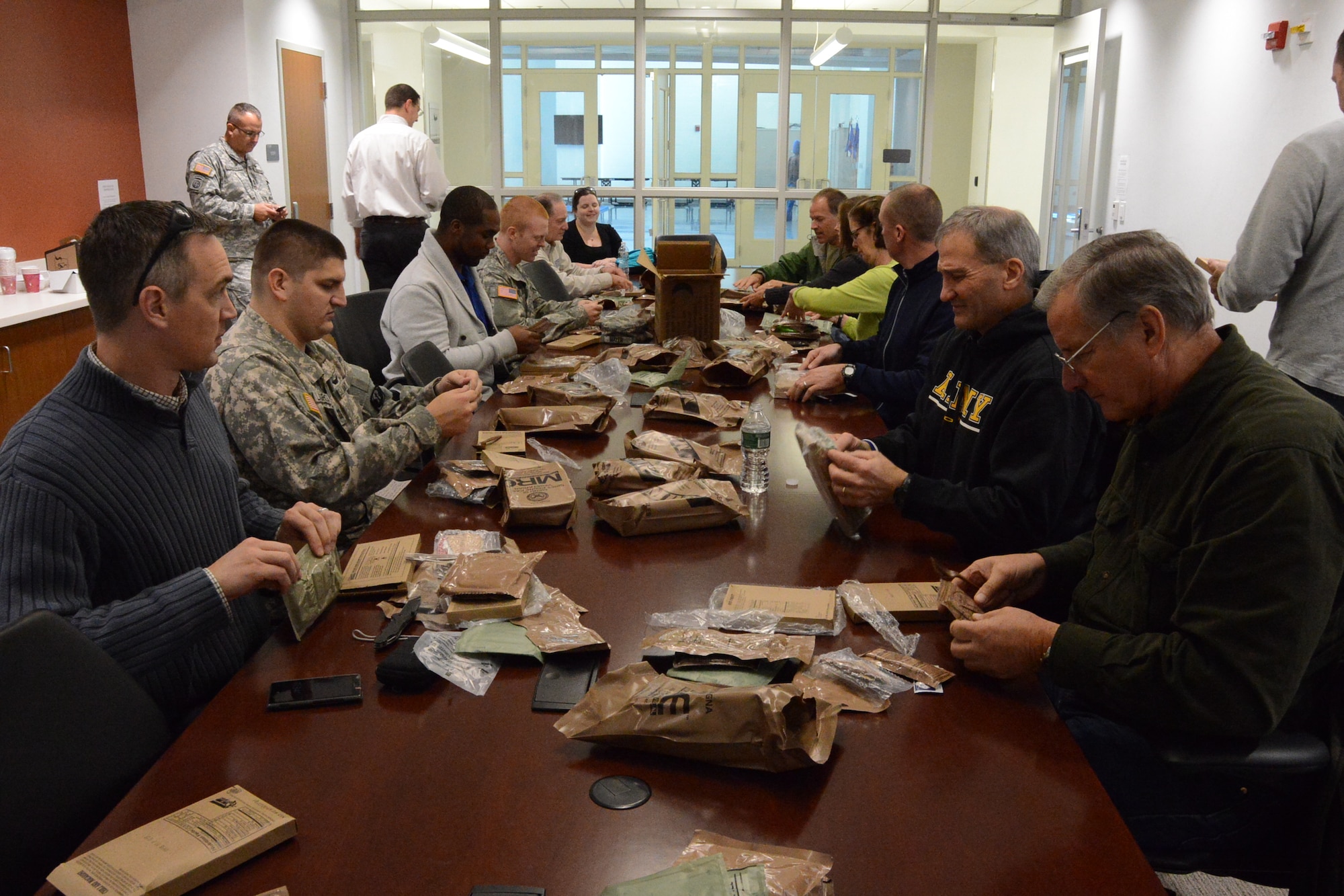 Civilian employers from around the state participated in an Employer Support of the Guard and Reserve “bosslift” event, Oct. 28, 2014, when they were given tours of both Connecticut Army and Air National Guard facilities and aircraft with the goal providing them with a better understanding and mutual respect of military members and their obligations.  Participants were treated to a real military experience when each member of the group was given a meal ready to eat (MRE) for lunch.  MREs are prepackaged food intended for military personnel working in the field.  (U.S. Air National Guard photo by Senior Airman Emmanuel Santiago)