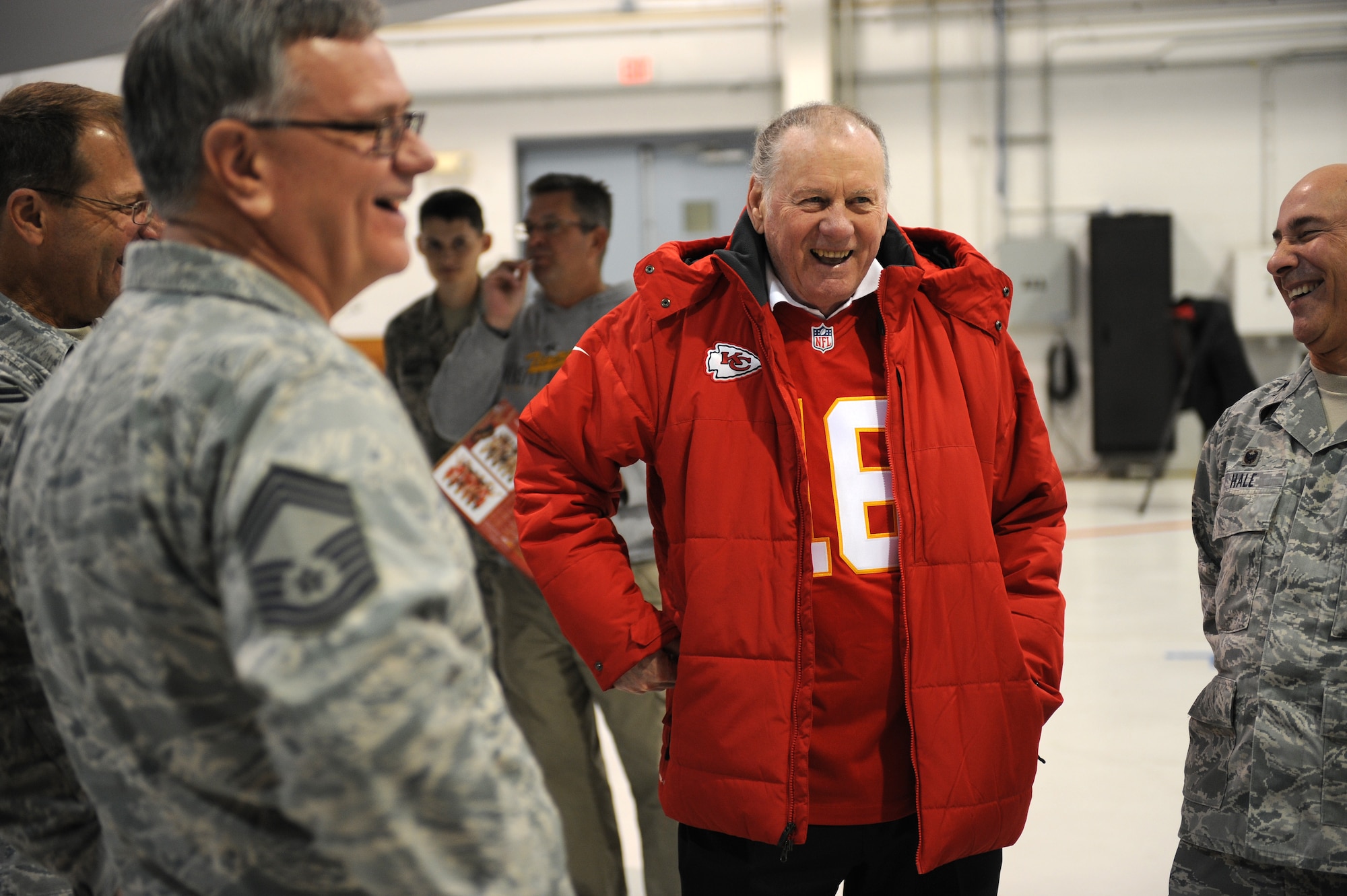 Retired Kansas City Chiefs quarterback Len Dawson laughs while meeting with members of Team Whiteman at Whiteman Air Force Base, Mo., Nov. 18, 2014. Dawson was the fifth overall pick in the 1957 NFL draft by the Pittsburgh Steelers. (U.S. Air Force photo by Airman 1st Class Joel Pfiester/Released)
