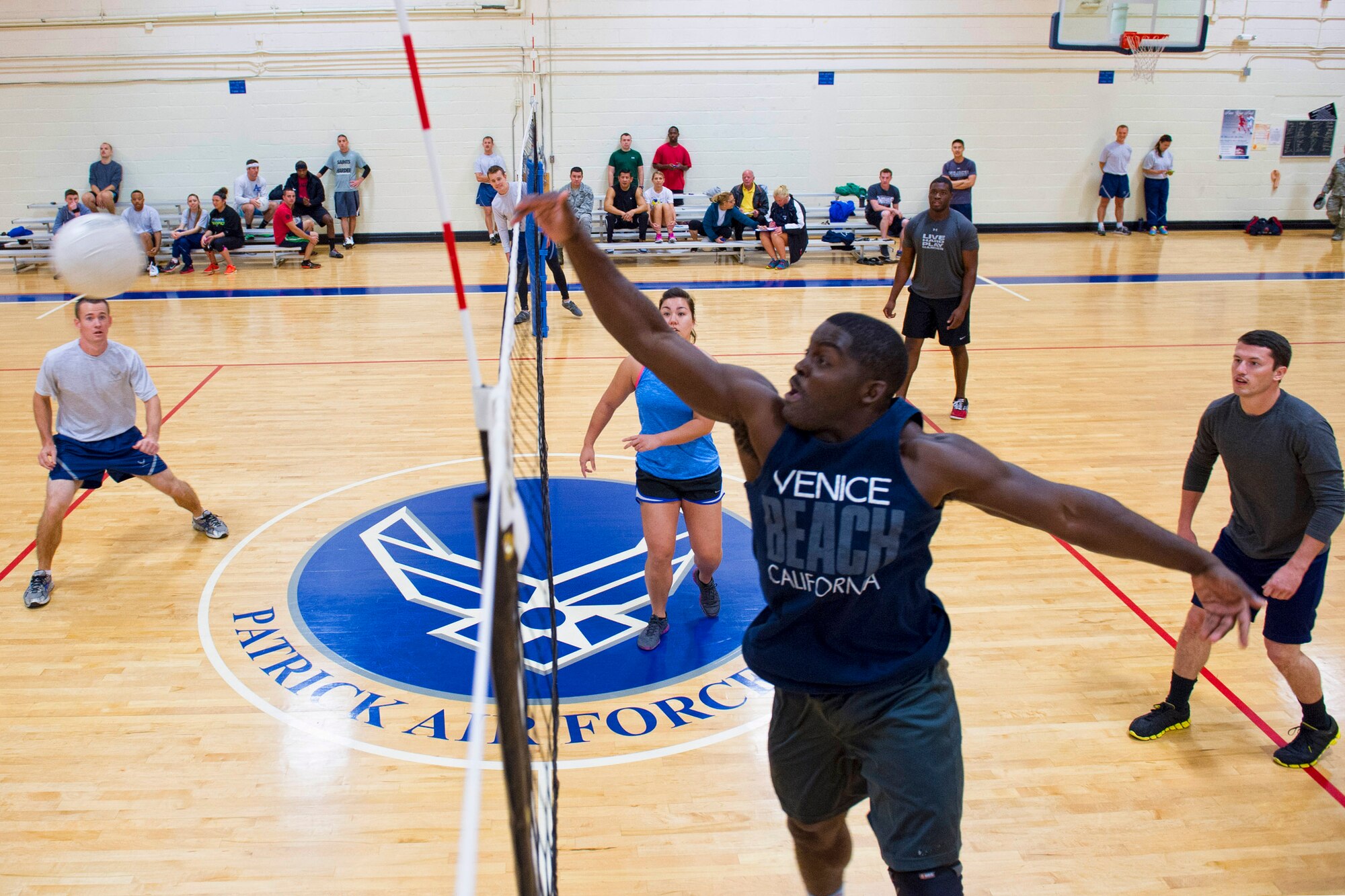 Members of Team Patrick-Cape participate in the 2014 Sports Week, during the week of Nov. 17-21, at Patrick Air Force Base, Fla. Sports Week is designed to bring together the 45th Space Wing and its mission partners for a friendly sports competition. Events began with an opening ceremony for a total of 18 sports and fitness competitions throughout the week. A closing ceremony and 5K Warrior Run, Nov. 21, 2014, will round out Sports Week.  (U.S. Air Force photo/Matthew Jugens)