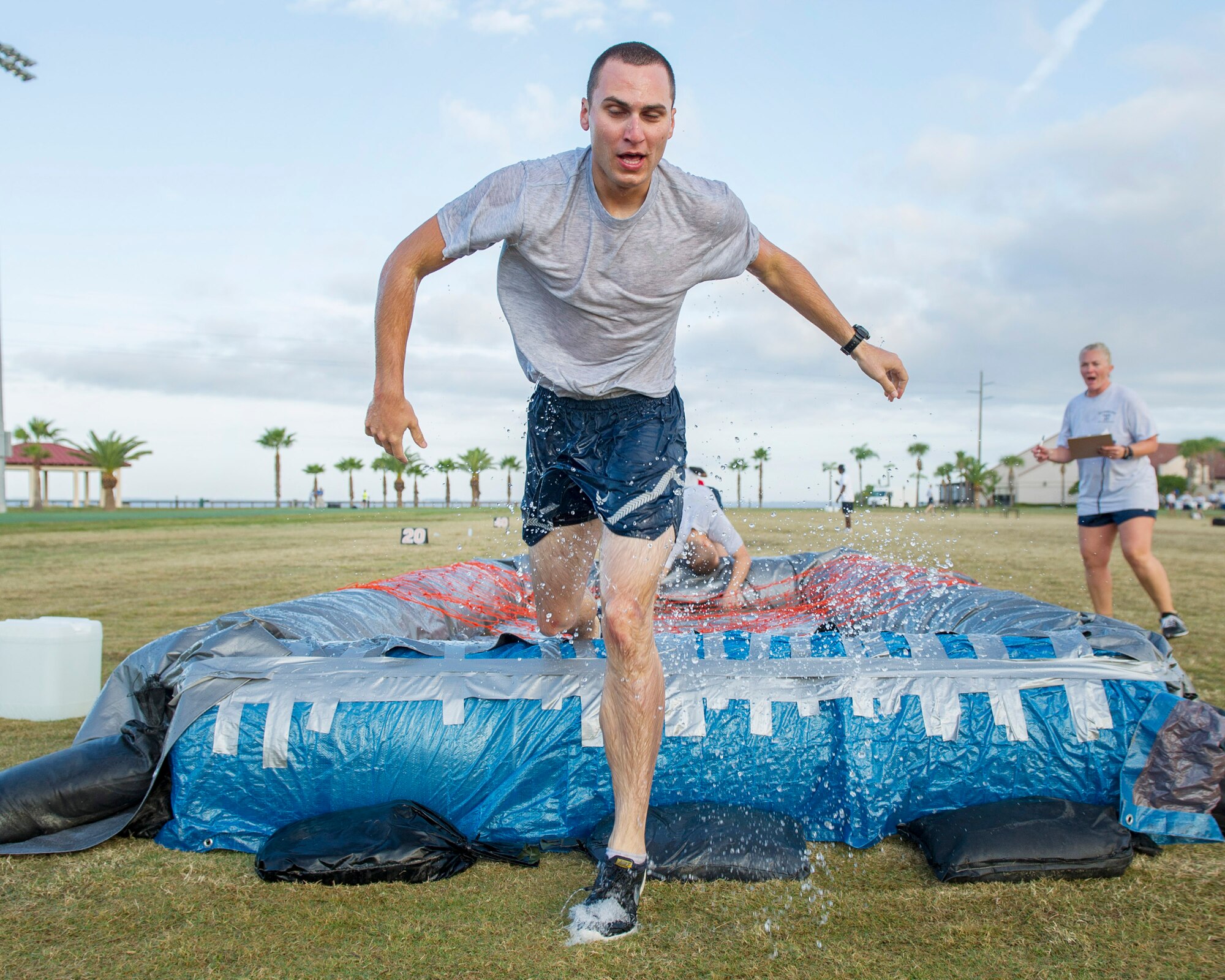 Members of Team Patrick-Cape participate in the 2014 Sports Week, during the week of Nov. 17-21, at Patrick Air Force Base, Fla. Sports Week is designed to bring together the 45th Space Wing and its mission partners for a friendly sports competition. Events began with an opening ceremony for a total of 18 sports and fitness competitions throughout the week. A closing ceremony and 5K Warrior Run, Nov. 21, 2014, will round out Sports Week.  (U.S. Air Force photo/Matthew Jugens)