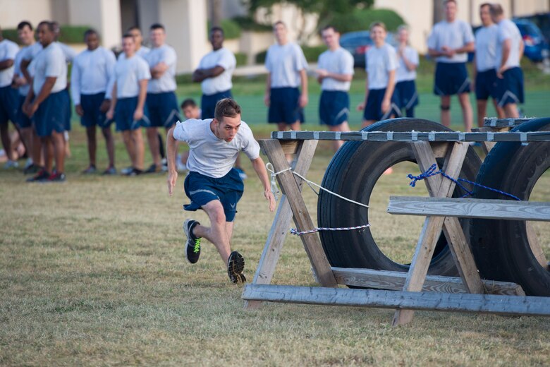 Members of Team Patrick-Cape participate in the 2014 Sports Week, during the week of Nov. 17-21, at Patrick Air Force Base, Fla. Sports Week is designed to bring together the 45th Space Wing and its mission partners for a friendly sports competition. Events began with an opening ceremony for a total of 18 sports and fitness competitions throughout the week. A closing ceremony and 5K Warrior Run, Nov. 21, 2014, will round out Sports Week.  (U.S. Air Force photo/Matthew Jugens)