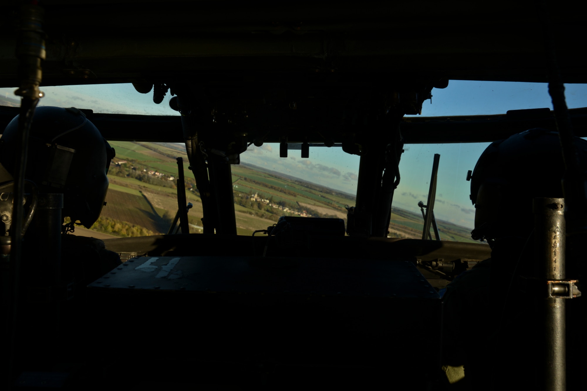 56th Rescue Squadron pilots fly a training mission at Royal Air Force Lakenheath, England, Nov. 12, 2014. The training exercise was an alternate insertion and extractions exercise to practice rescuing personnel from areas where helicopters cannot land. (U.S. Air Force photo by Airman 1st Class Erin R. Babis/Released)