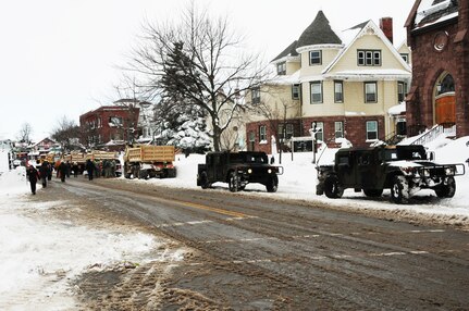 New York Army National Guard Soldiers from the 152nd Engineer Company use engineering equipment to assist in snow removal efforts in Buffalo, New York, Nov. 20, 2014 .