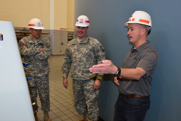 Center Hill Power Plant Superintendent Jody Craig, U.S. Army Corps of Engineers Nashville District, (right) leads the Great Lakes and Ohio River Division commander, Brig. Gen. Richard G. Kaiser (center) and Lt. Col. John L. Hudson Nashville District commander,(left)on a tour of the Center Hill Dam Power Plant Nov. 19, 2014.  This was Kaiser's first visit to the district since taking command September 2014. He also toured the Kentucky Lock Addition Project in Grand Rivers, Ky and the Nashville District Headquarters.