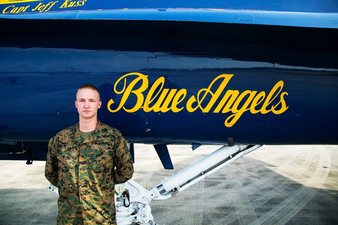 Sergeant Casey Hourigan , an airframes mechanic with Marine Fighter Attack Squadron 312 aboard Marine Corps Air Station Beaufort, checks into the Navy Flight Demonstration Squadron, also known as the Blue Angels, in Pensacola, Fla., Dec. 8.