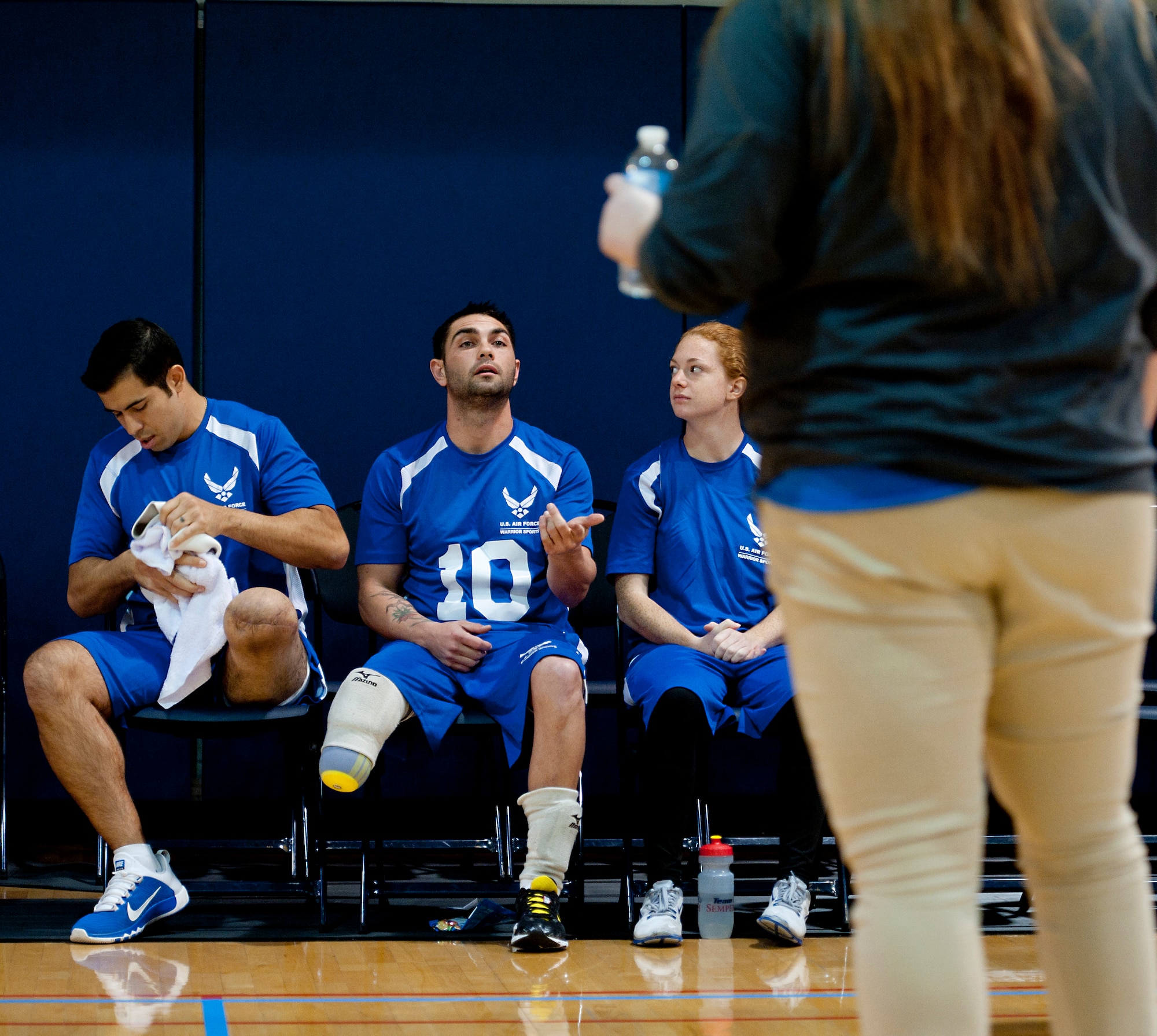 Retired Staff Sgt. Nicholas Dadgostar, talks about strategies with one of the volleyball coaches during 4th Annual Pentagon Sitting Volleyball Tournament Nov. 20, 2014, at the Pentagon Athletic Club.  Warrior Care Month was established in 2008, when former Secretary of Defense Robert F. Gates declared it would be a "DOD effort aimed at increasing awareness of programs and resources available to wounded, ill and injured service members, their families, and those who care for them."  (U.S. Air Force photo/Staff Sgt. Anthony Nelson Jr.) 