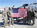 From left to right, Spc. Thomas White, Maj. John L. Baynham Jr., Chief Warrant  Officer 5 Joel D. Smith, Sgt. Jamie Cohodes and Chief Warrant Officer 2  Shandella Vaughan are members of Company B of the 3rd Battalion, 214th  Aviation Regiment, which participated in the initial deployment of Task Force Observe, Detect, Identify, and Neutralize in Afghanistan. The unit will redeploy this weekend