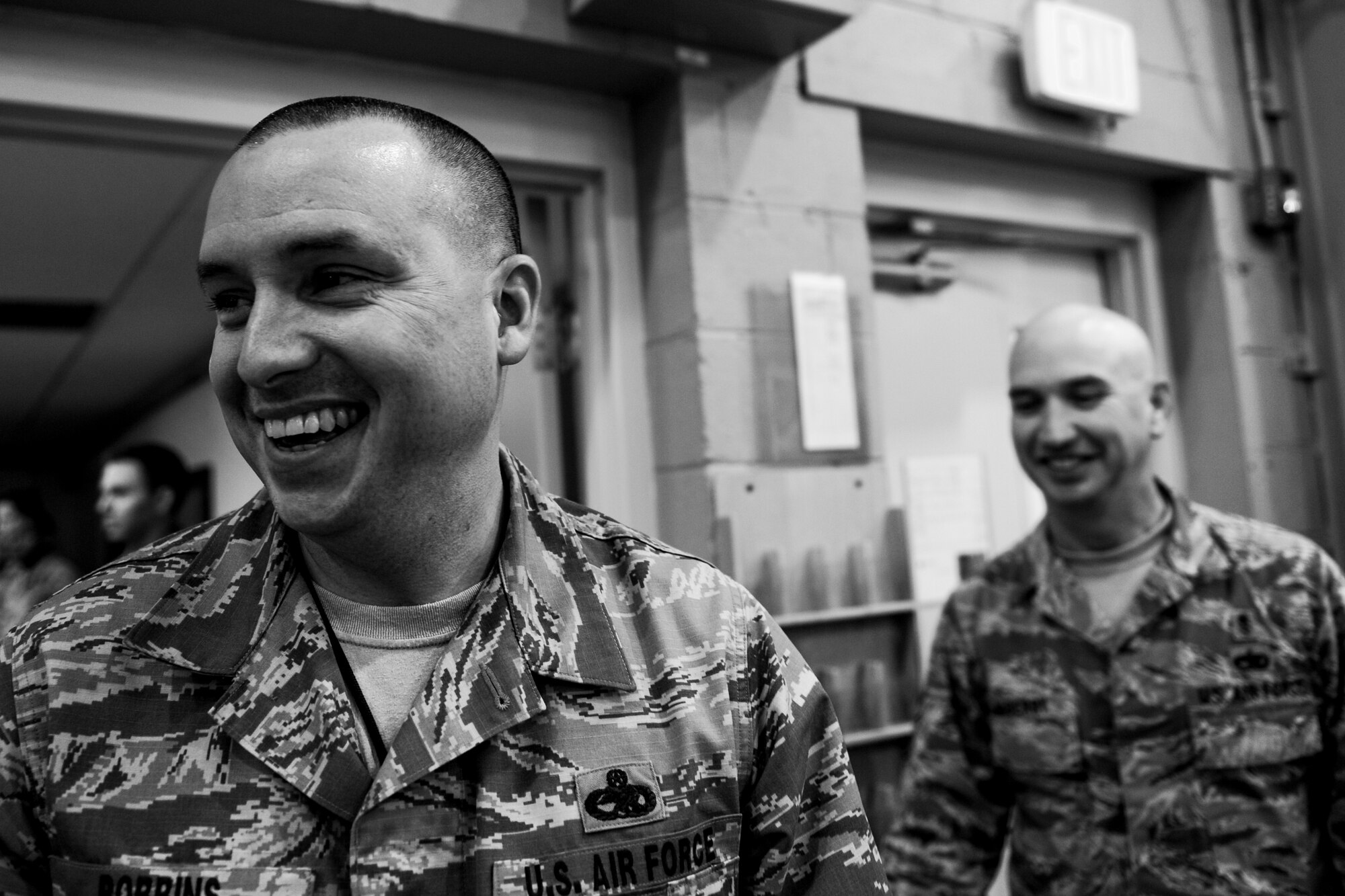 Senior Master Sgt. Lee Robbins, 1st Special Operations Aircraft Maintenance Squadron, is greeted members of the Chiefs group to celebrate his selection to Chief Master Sgt. at Hurlburt Field, Fla., Nov. 20, 2014. The Chiefs Group drove around Hurlburt to congratulate 15 chief selects. (U.S. Air Force photo/Senior Airman Christopher Callaway)
