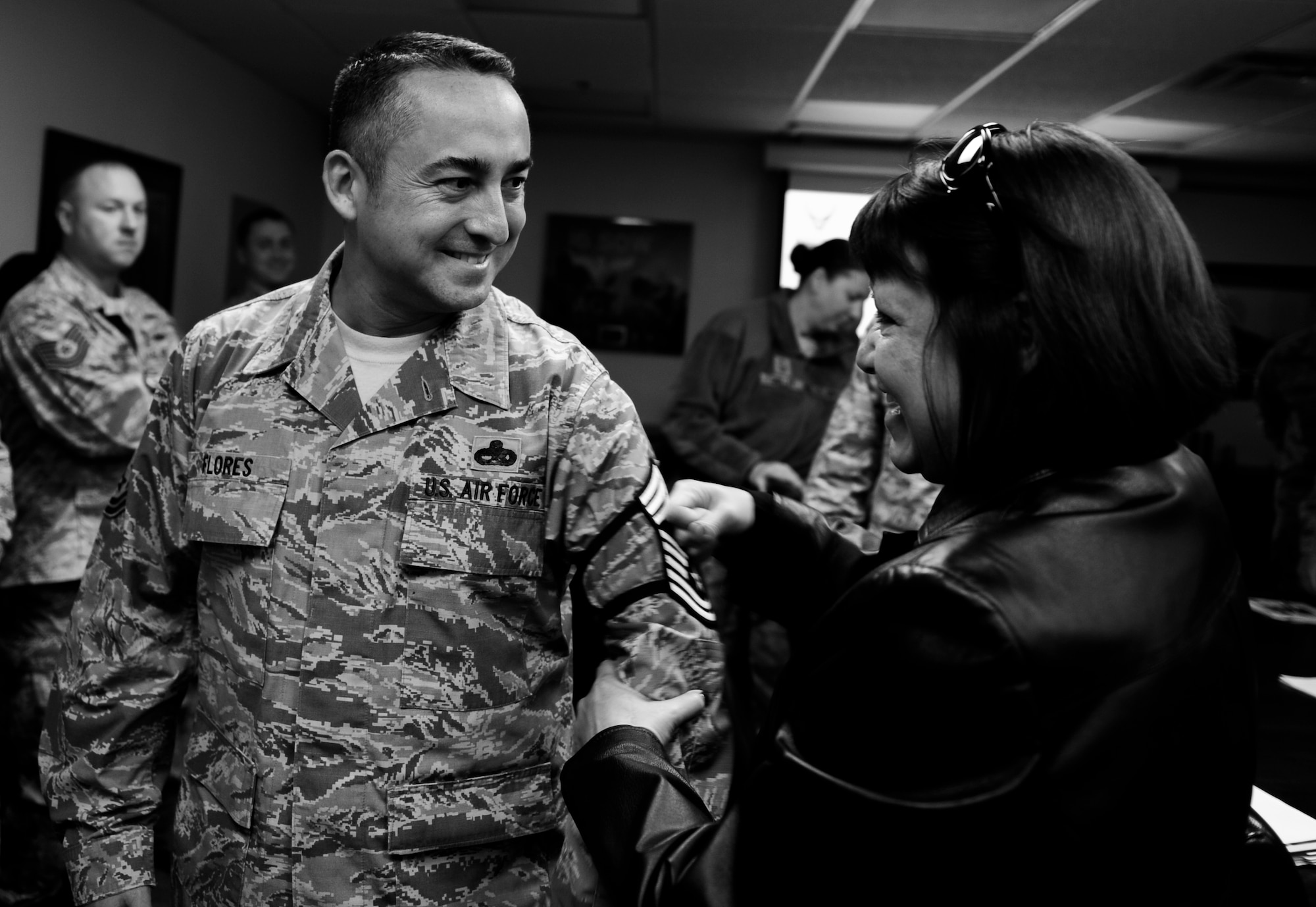 Senior Master Sgt. Alberto Flores, 1st Special Operations Aircraft Maintenance Squadron, is congratulated for being selected for promotion to Chief Master Sgt. at Hurlburt Field, Fla., Nov. 20, 2014. The Chiefs Group drove around Hurlburt to congratulate 15 chief selects. (U.S. Air Force photo/Senior Airman Christopher Callaway)