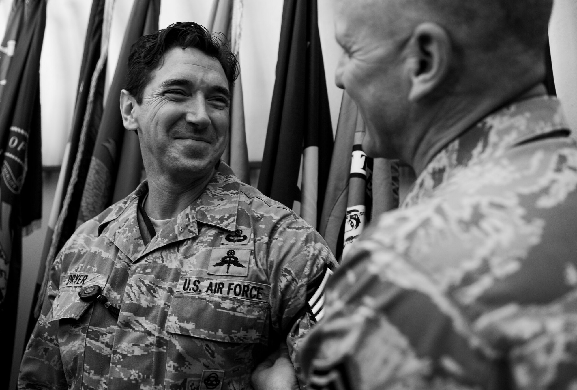 Senior Master Sgt. Jason Dryer, an Air Force Special Operations Command chief joint terminal attack controller, receives congratulations for his promotion to Chief Master Sgt. at Hurlburt Field, Fla., Nov. 20, 2014. Chief Master Sgts. is the highest enlisted rank and make up only one percent of the enlisted Air Force. (U.S. Air Force photo/Senior Airman Christopher Callaway)