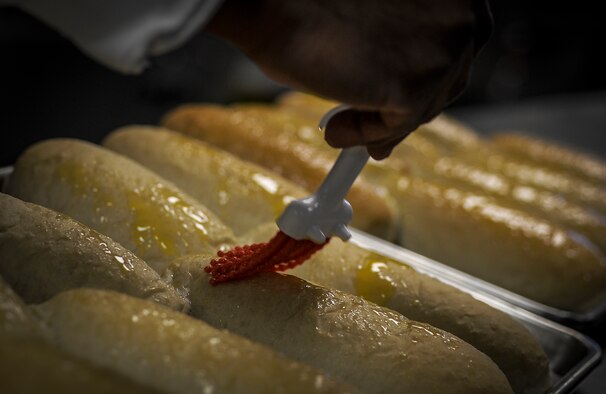 Bread is buttered at the Reef Dining Facility on Hurlburt Field, Fla., Nov. 12, 2014. (U.S. Air Force photo/Senior Airman Christopher Callaway)
