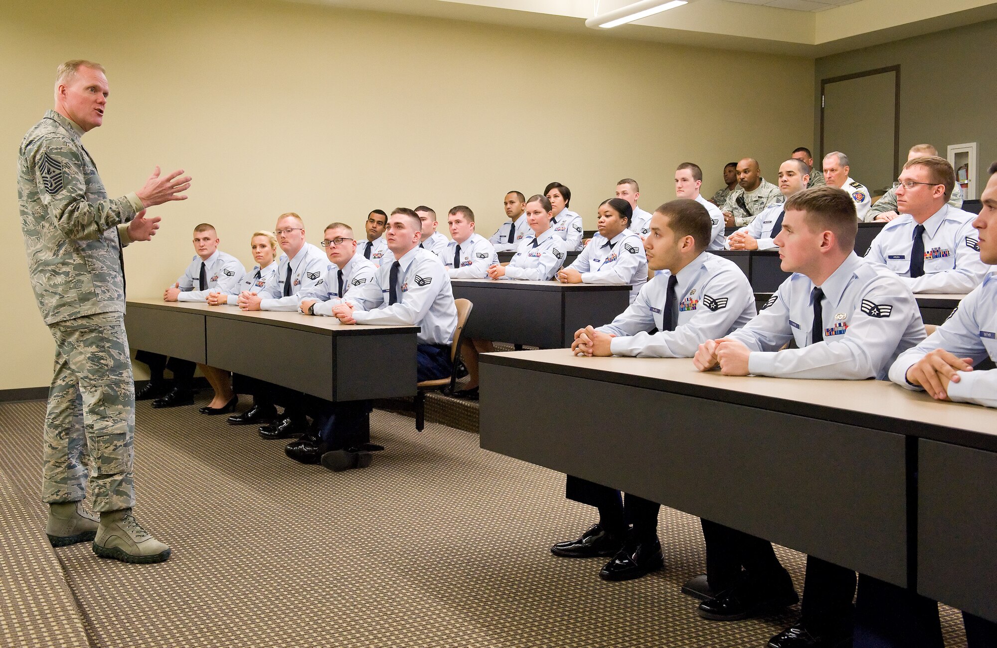 Chief Master Sgt. of the Air Force James Cody speaks to students of Class 15-B on their first day of training Nov. 18, 2014, at the Staff Sgt. Julio Alonso Airman Leadership School on Dover Air Force Base, Del. Cody spoke to the 28 students about humility, leadership, promotion and what will be expected from them upon graduation as first-line supervisors. (U.S. Air Force photo/Roland Balik)